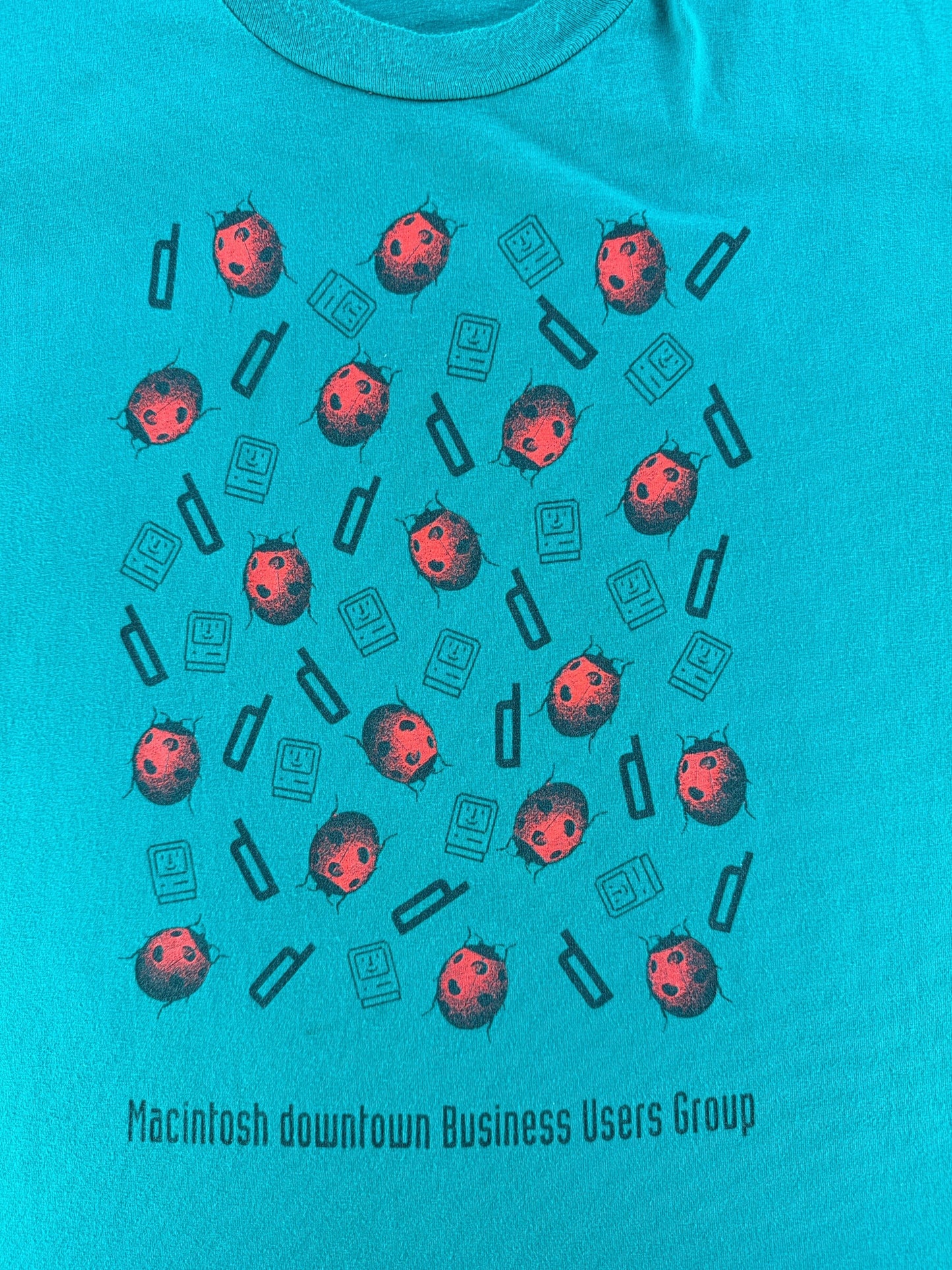Front Graphic of Vintage Macintosh Business Users Group Ladybug Tee SZ L