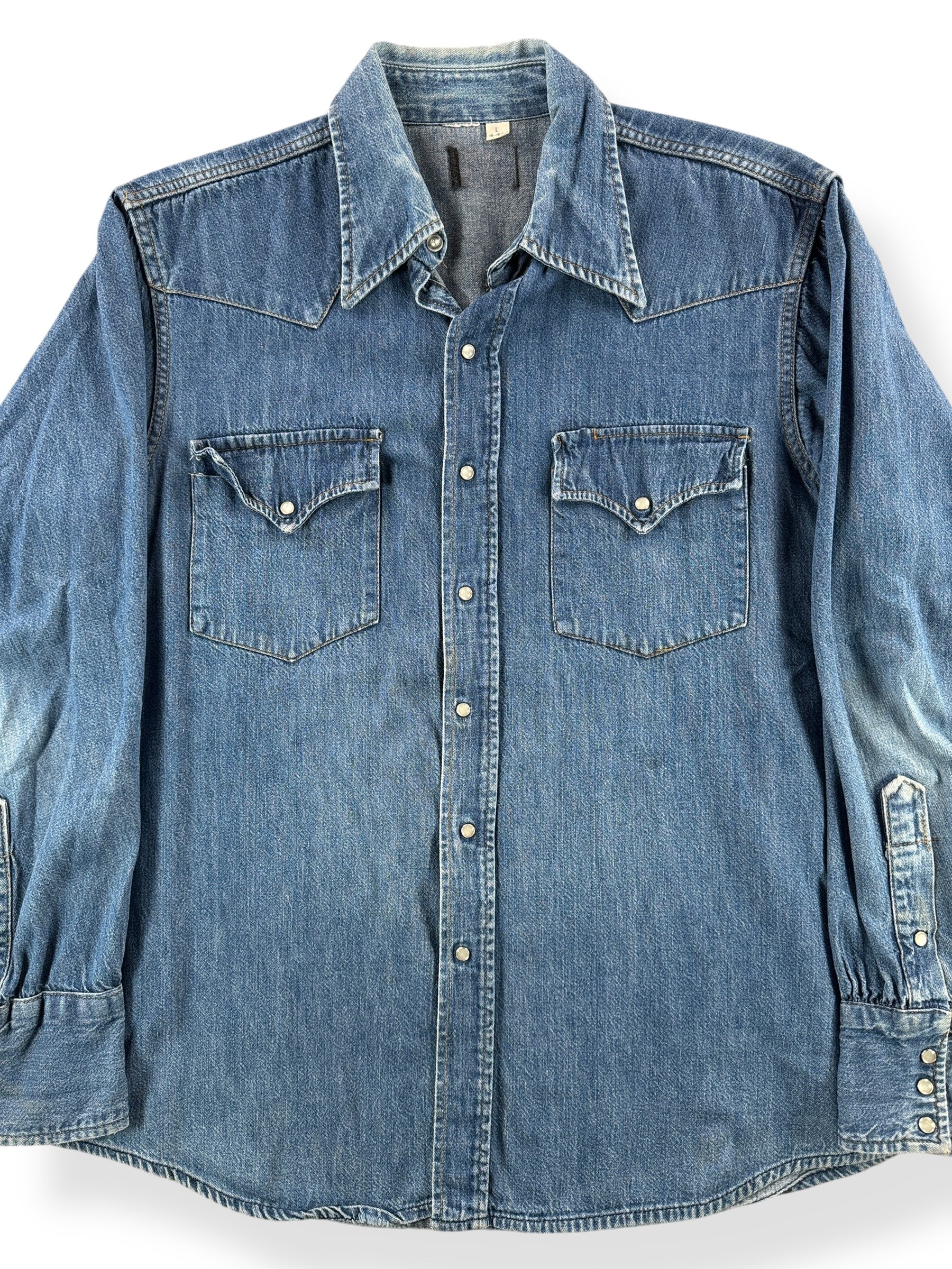 Front Close Up of Vintage Denim Pearl Snap SZ L