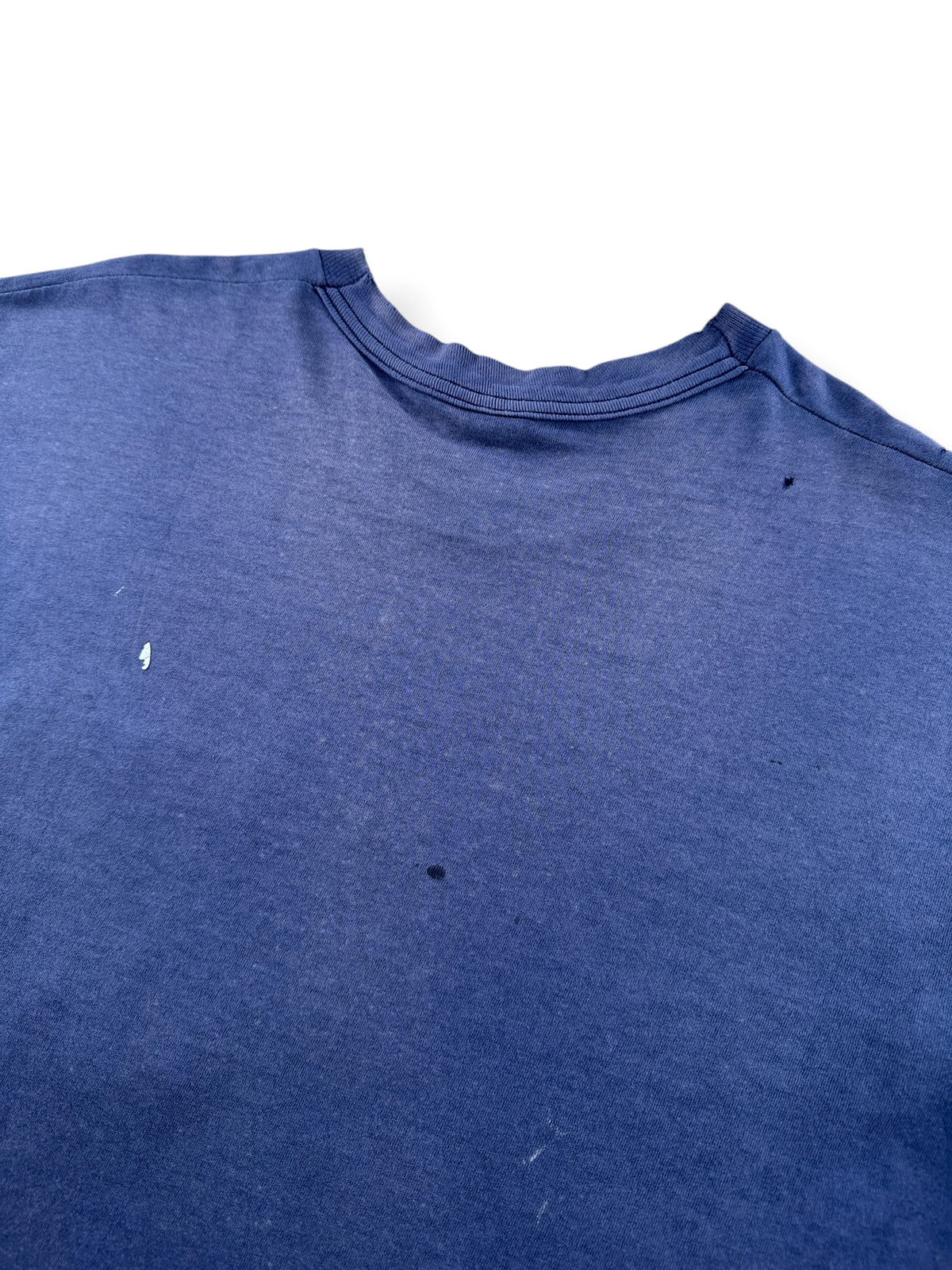 Wear on back of Vintage Distressed Navy Blue Pocket Tee SZ L