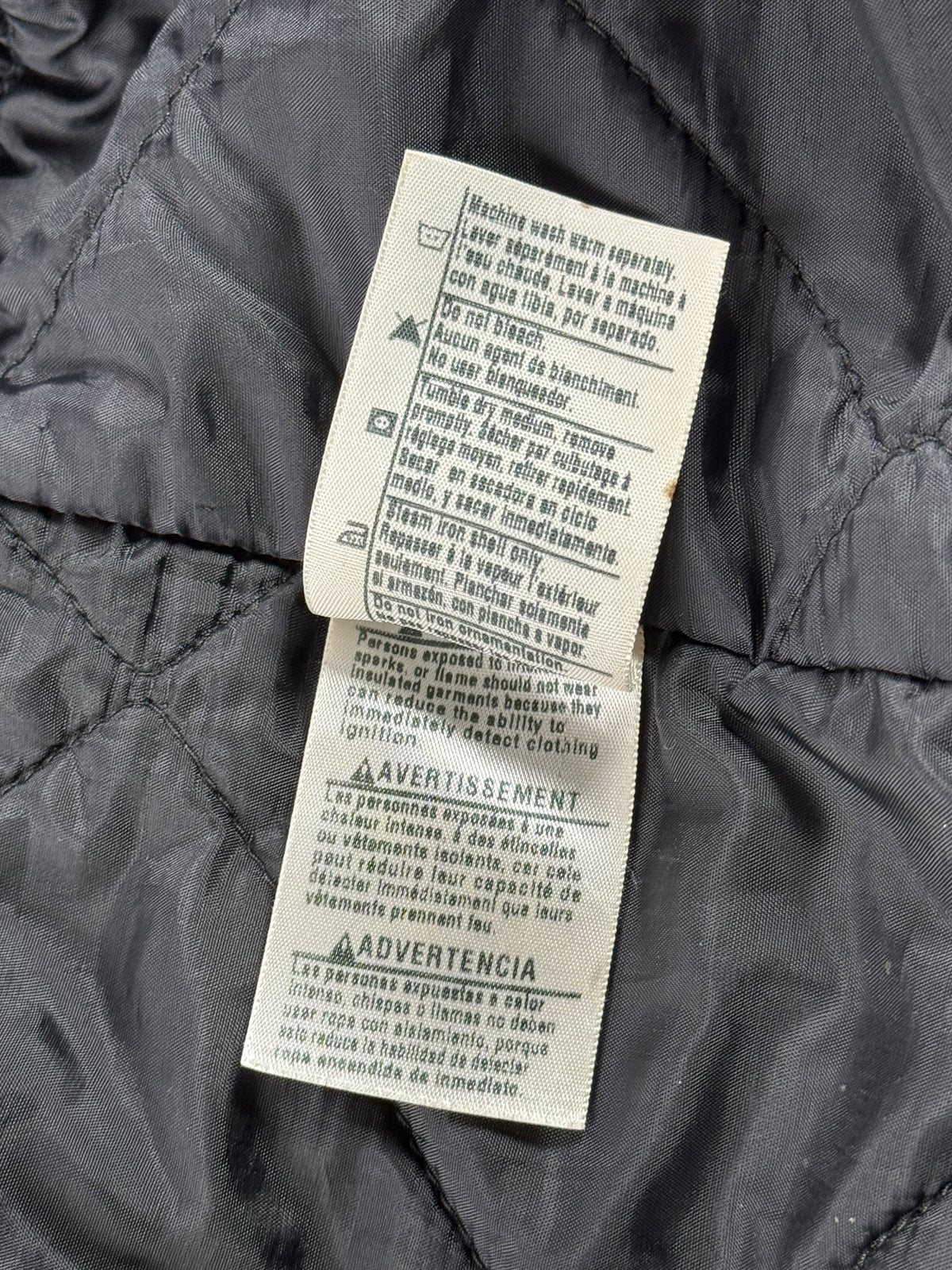 Inner tag on Vintage Carhartt Arctic Jacket Faded Brown SZ M-T