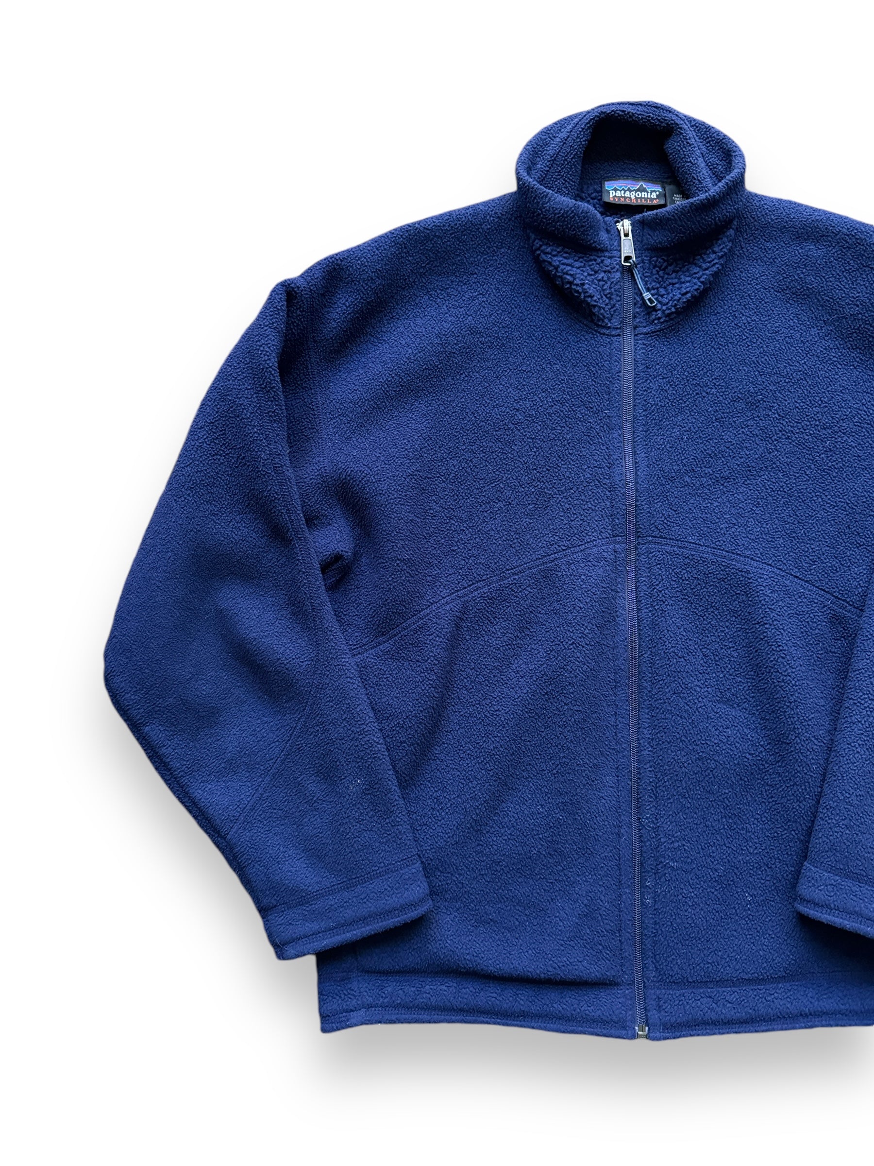 front right of Vintage Patagonia Navy Synchilla Fleece SZ S