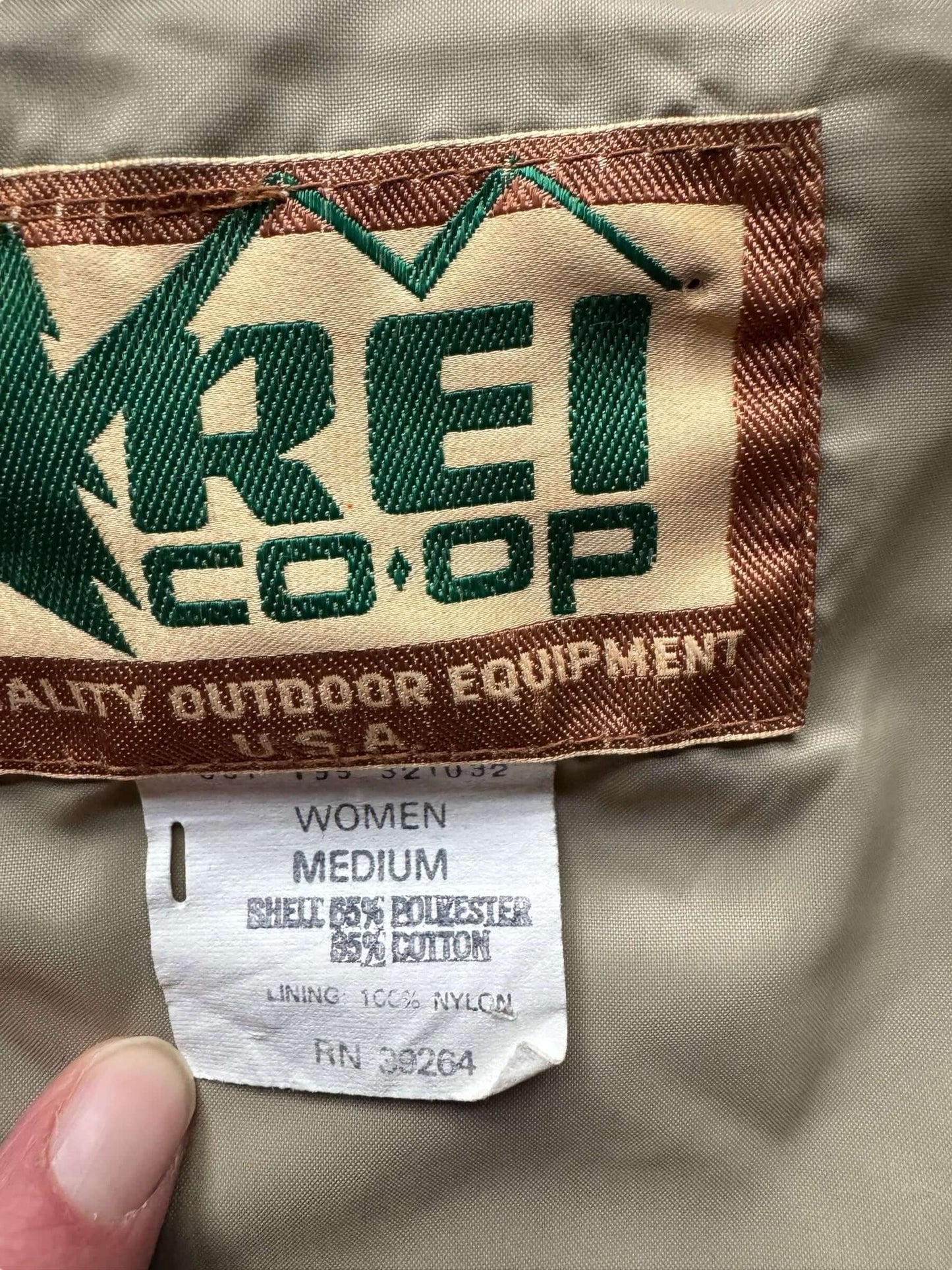 Tag view of 1980s Women's REi Co-Op Rain Jacket M