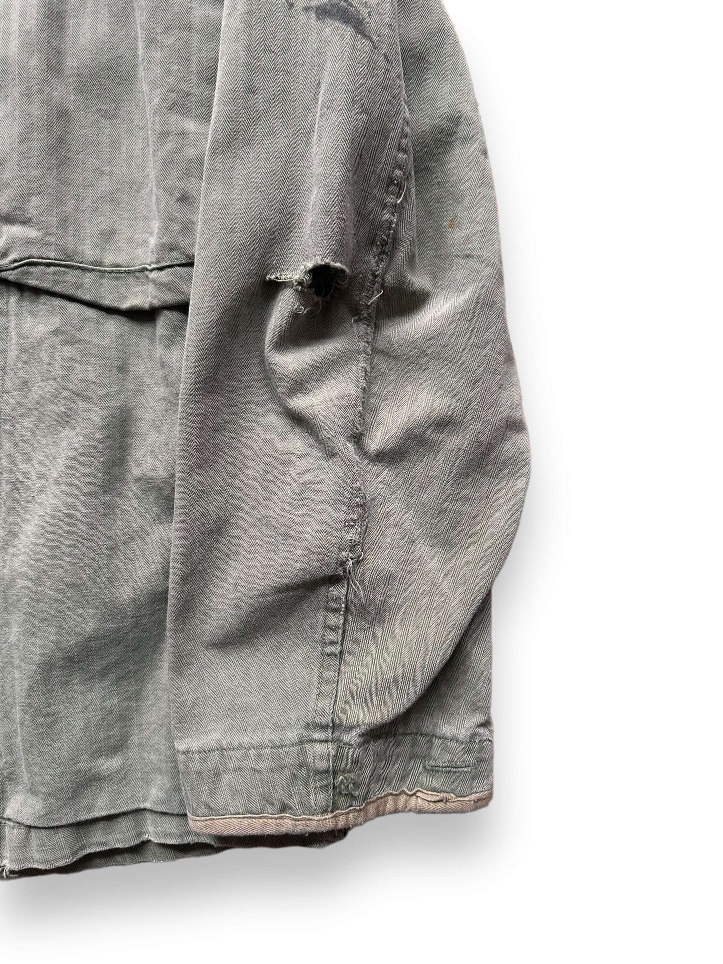 left sleeve of Vintage HBT "Kenny" Repaired Jacket SZ L | Vintage Military Jackets Seattle | Barn Owl Vintage Clothing Seattle