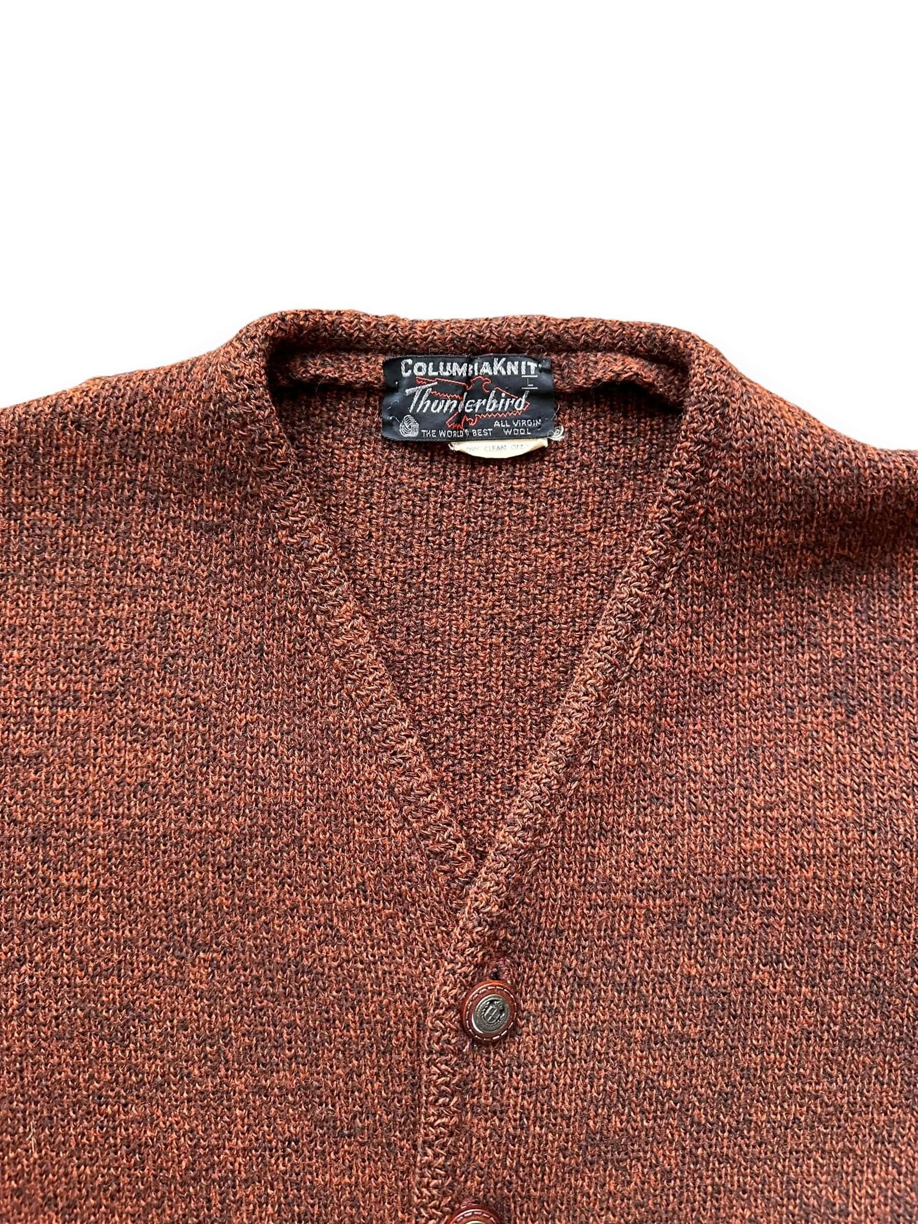 collar of Vintage 1950s Columbia Knit Thunderbird Brown/Orange Wool Cardigan SZ L