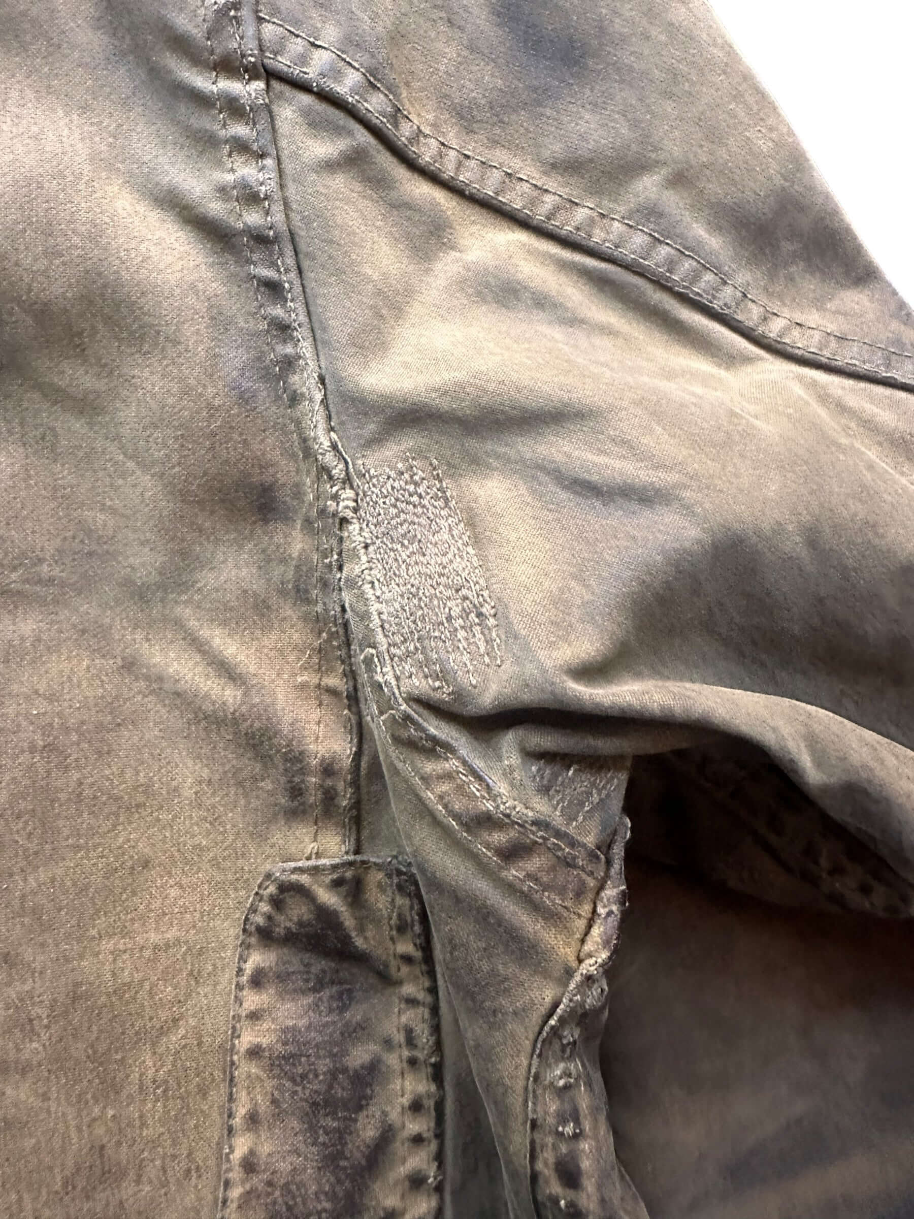 Close Up of Shoulder Seam Repairs on Distressed & Repaired Filson Tin Cloth Cruiser Size XL