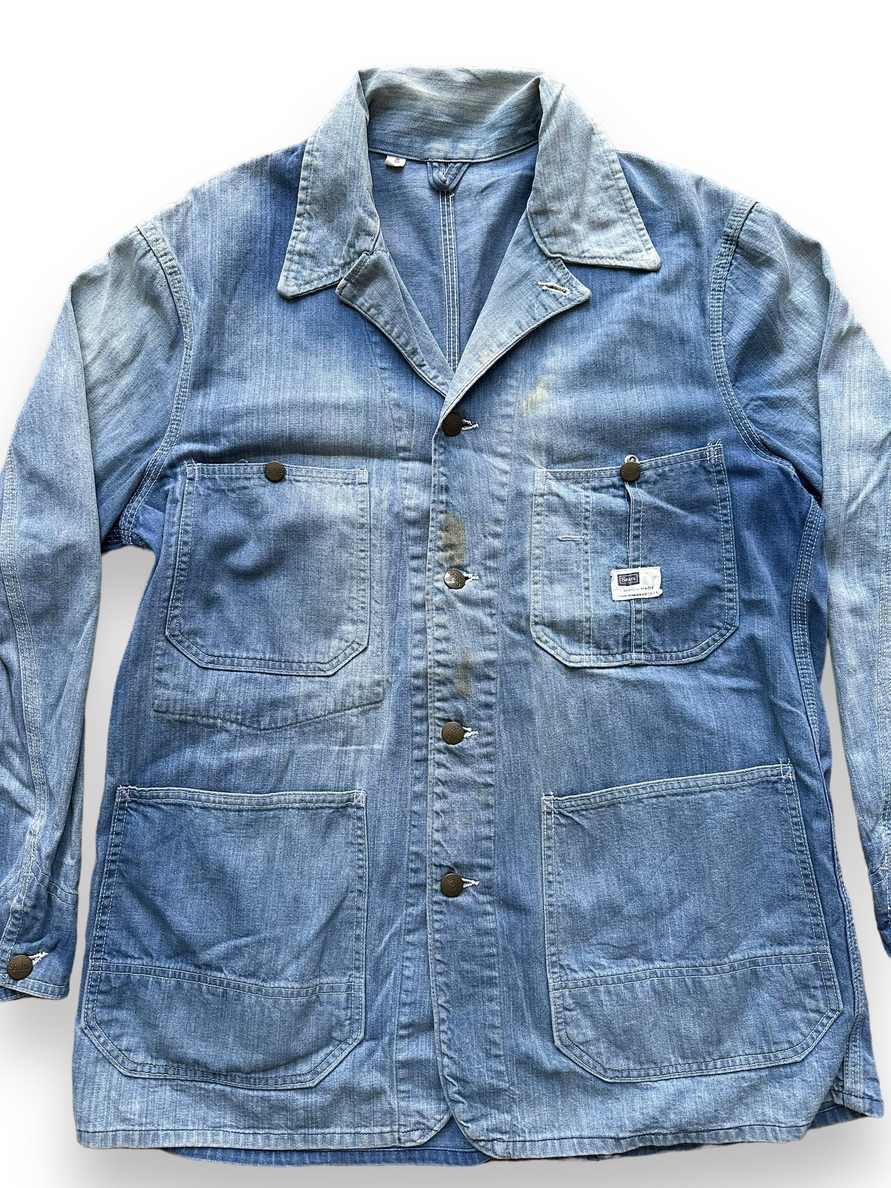 front close up of Vintage Sunfaded Sears Denim Chore Coat SZ 40