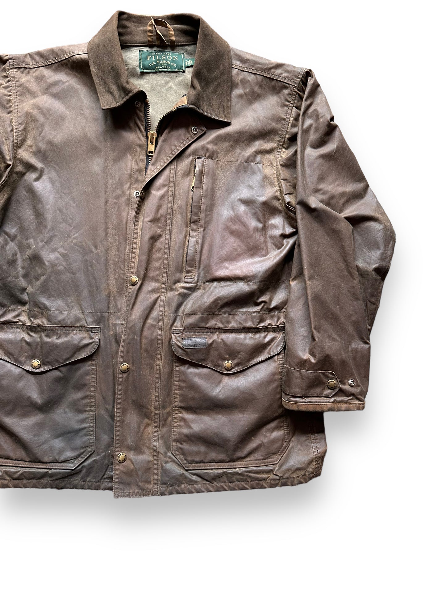 front left of Vintage Filson Waxed Jacket SZ L |  Barn Owl Vintage Goods | Vintage Filson Workwear Seattle