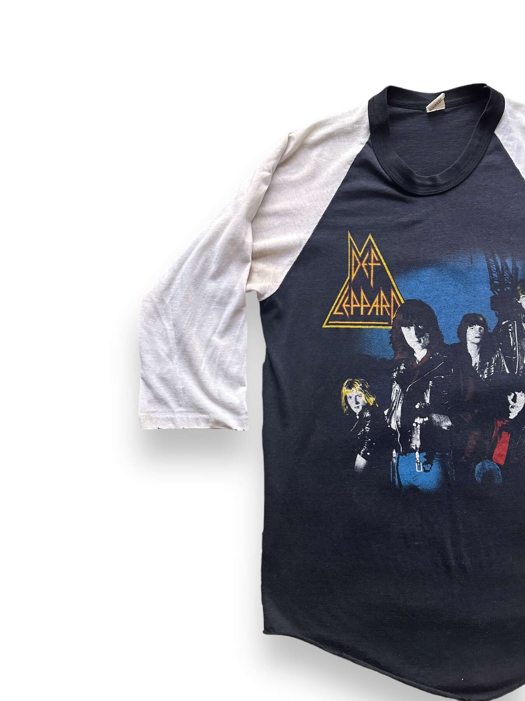 front right of Vintage Def Leppard "Rock Brigade" Raglan Band Tee Shirt SZ L