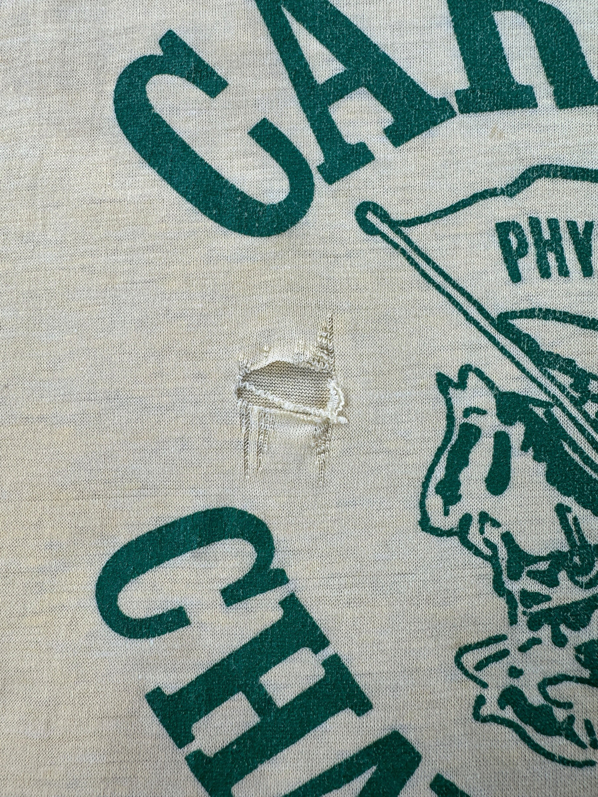 Small hole on Vintage 70s Era Carver Challengers Tee SZ L (Fits M)