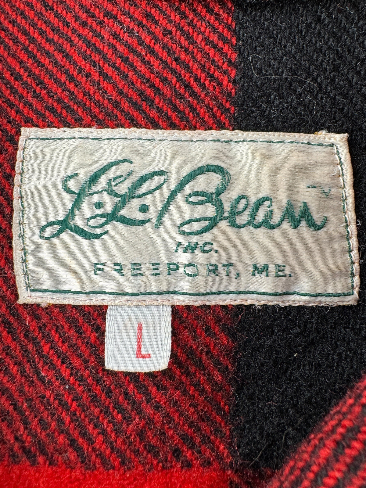 Label and size tag on Vintage LL Bean Script Era Zip Up Wool Jacket SZ L