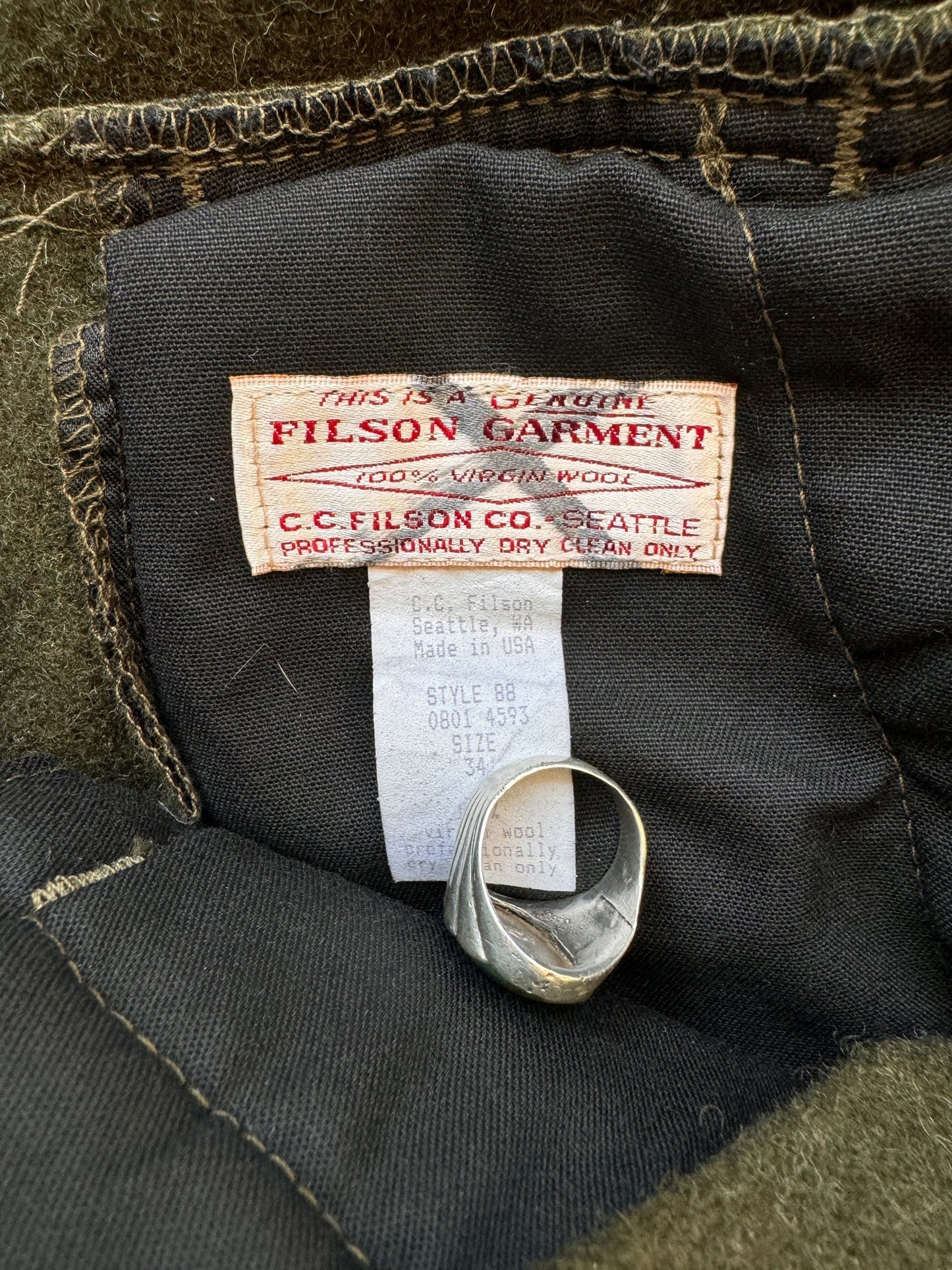 Tag View of Vintage Filson Forest Green Wool Bibs W34