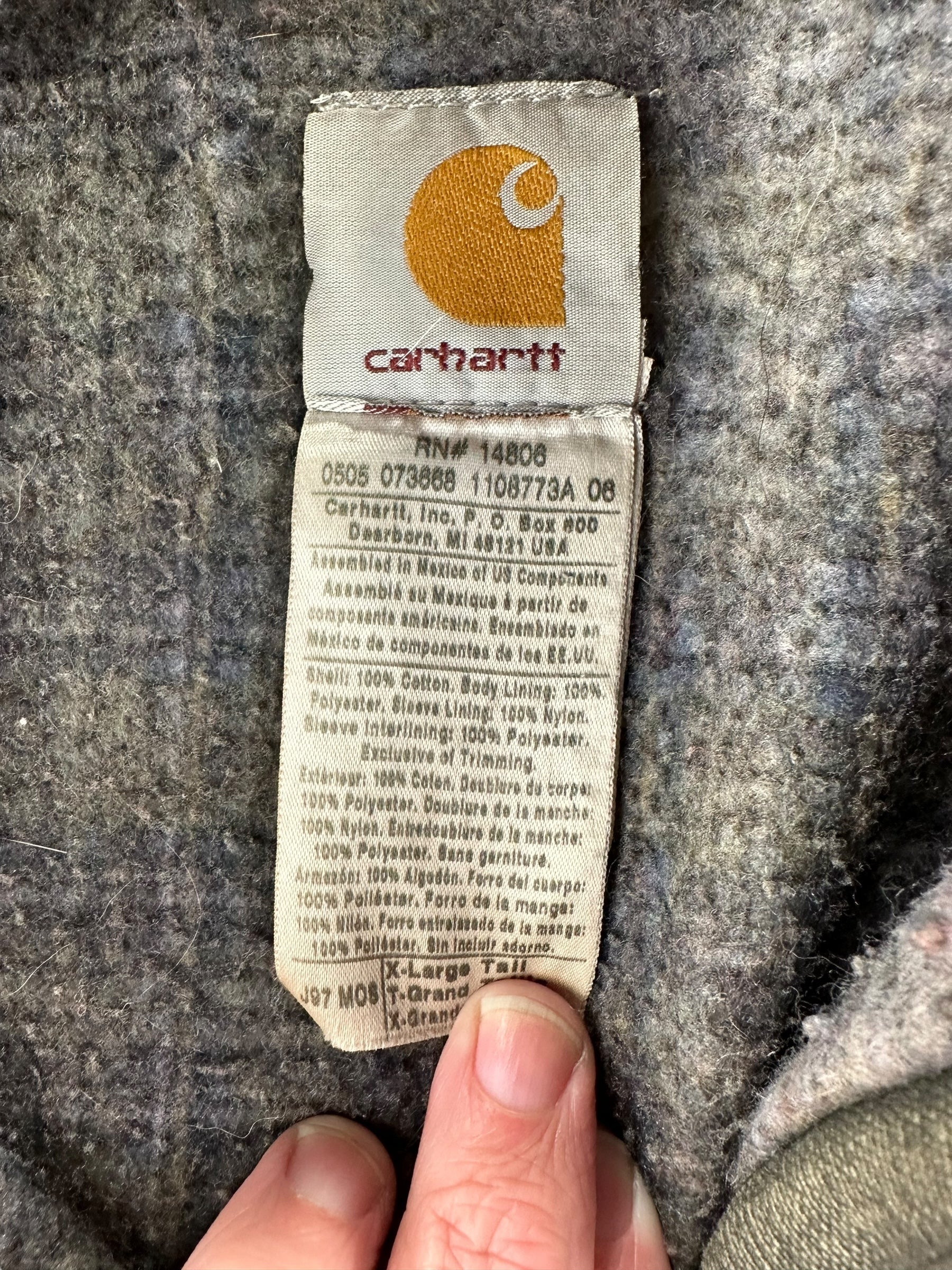 Tag Close Up on Distressed Repaired Carhartt Detroit Jacket J97 Moss SZ XL Tall