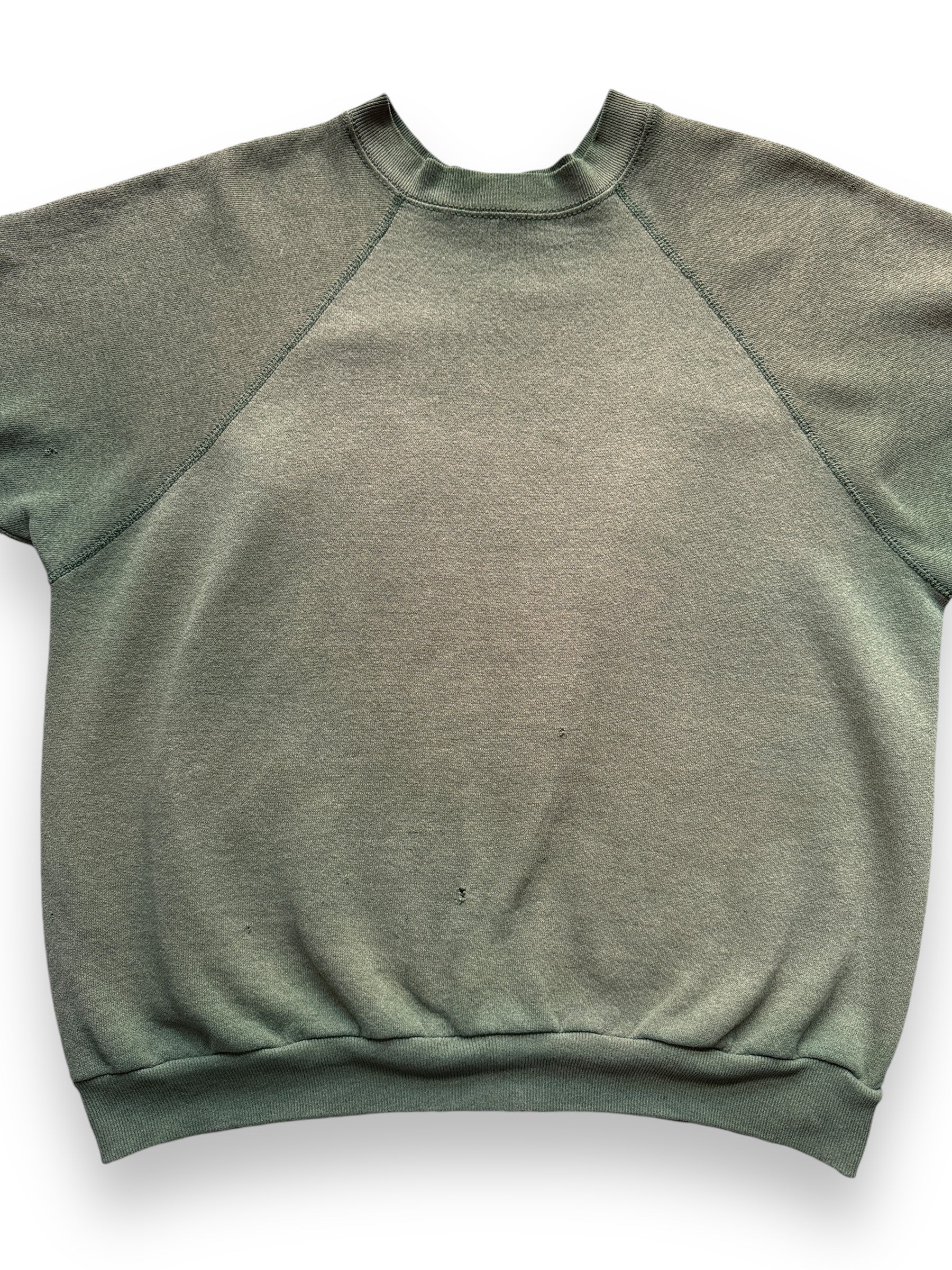 Front Detail on Vintage Faded Olive Green Short Sleeve Crewneck SZ L