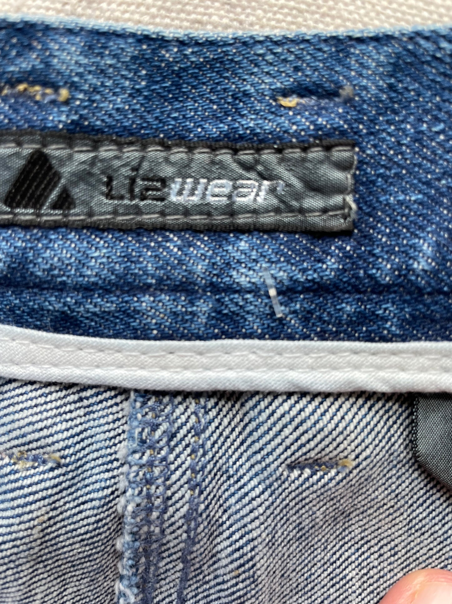 Product tag view of Vintage Deadstock 80's Liz Claiborne Side Zip Stir Up Jeans