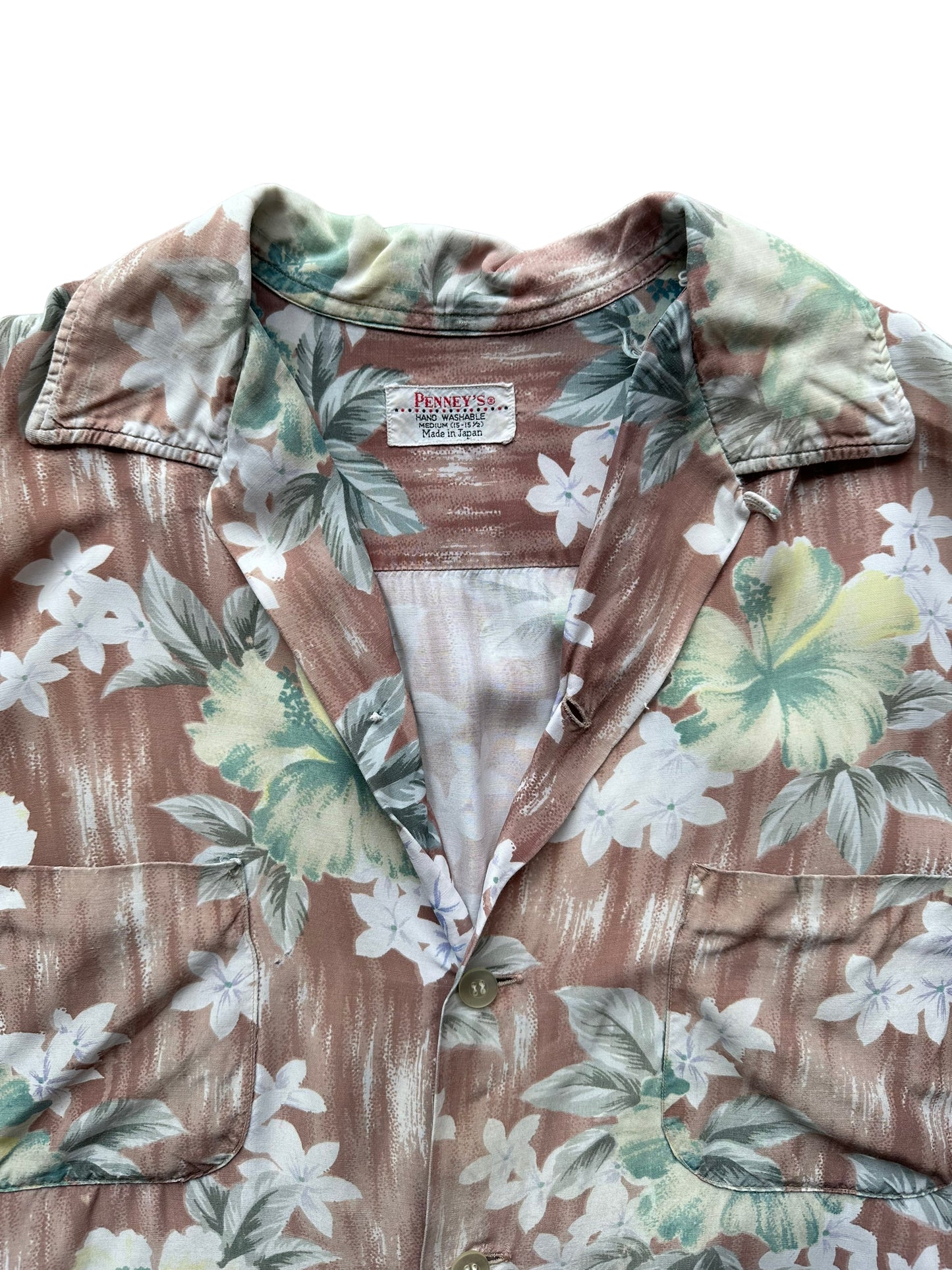 Front collar shot of Vintage Made in Japan Penney's Brown/Green Floral Aloha Shirt SZ M | Seattle Vintage Rayon Hawaiian Shirt | Barn Owl Vintage Clothing Seattle