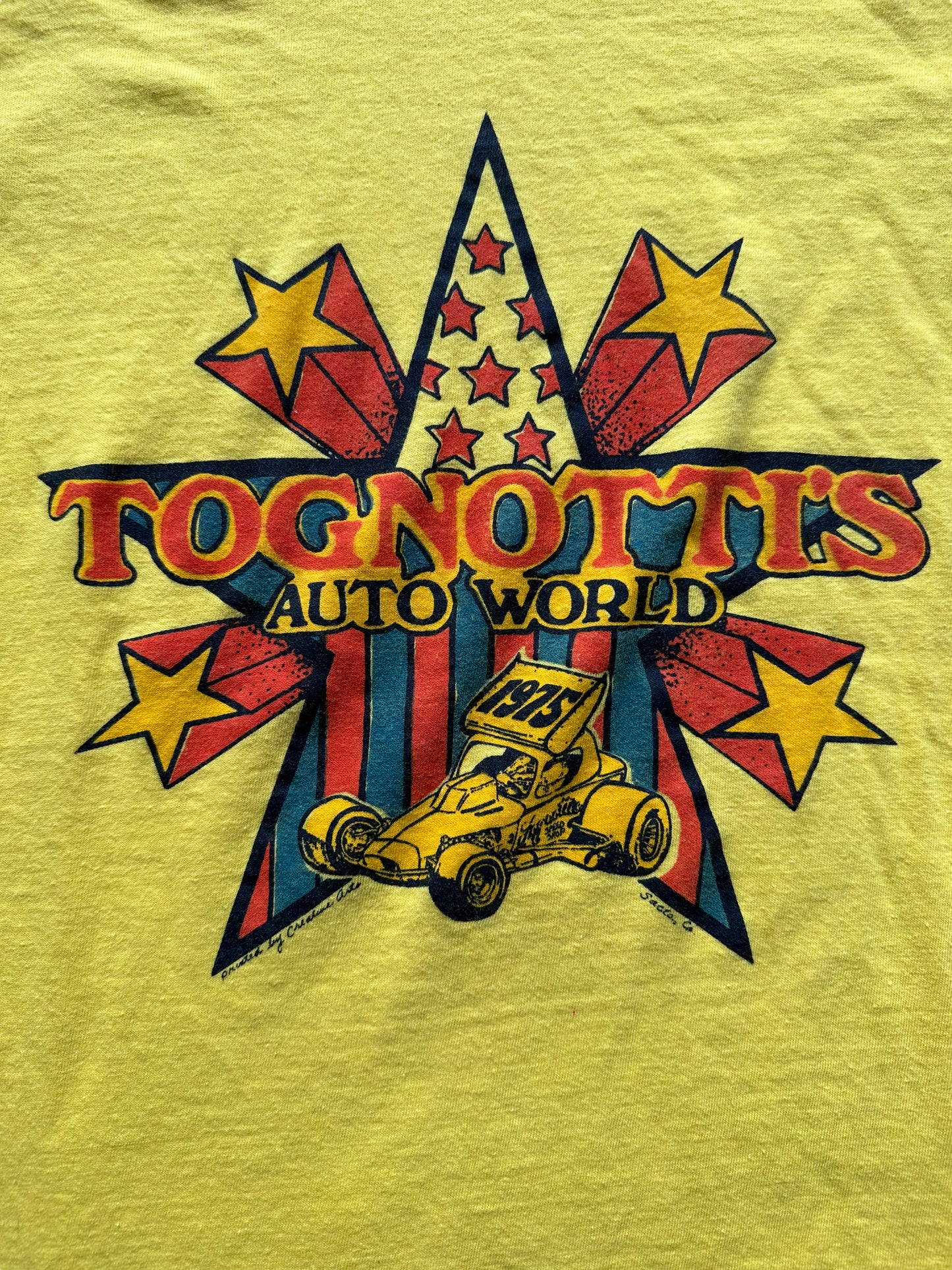 Graphic of Vintage Tognotti's Auto World Tee SZ S |  Vintage Auto Tee Seattle | Barn Owl Vintage