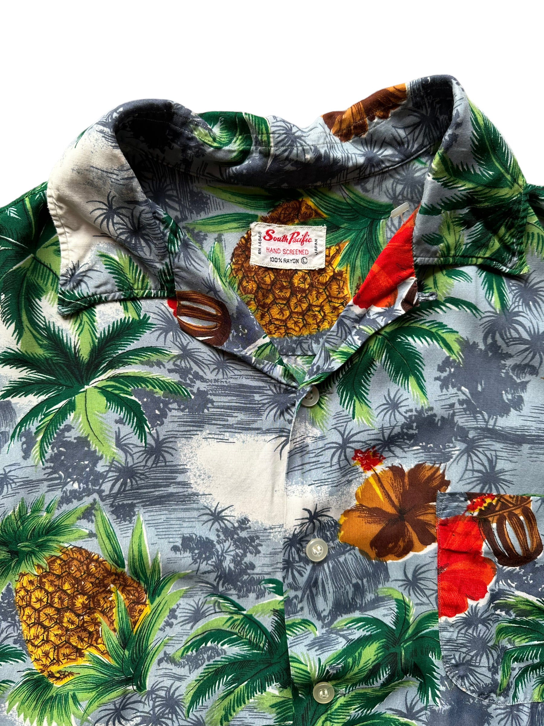 Tag shot of Vintage Made in Japan South Pacific Grey Pineapple Aloha Shirt SZ L | Seattle Vintage Rayon Hawaiian Shirt | Barn Owl Vintage Clothing Seattle