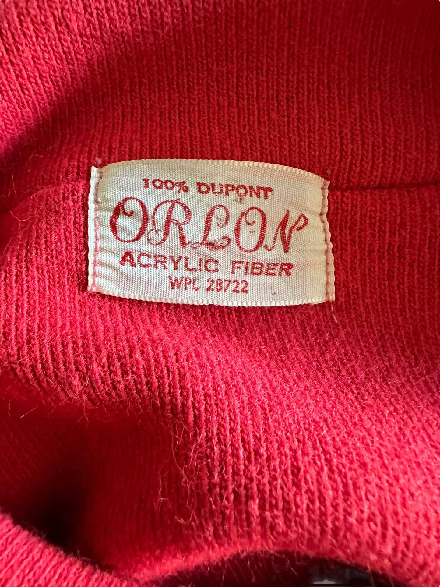 Tag view of Vintage 1950s Coral Pink Orlon Short Sleeve Sweater | Vintage 1950s Sweaters | Barn Owl Ladies Vintage