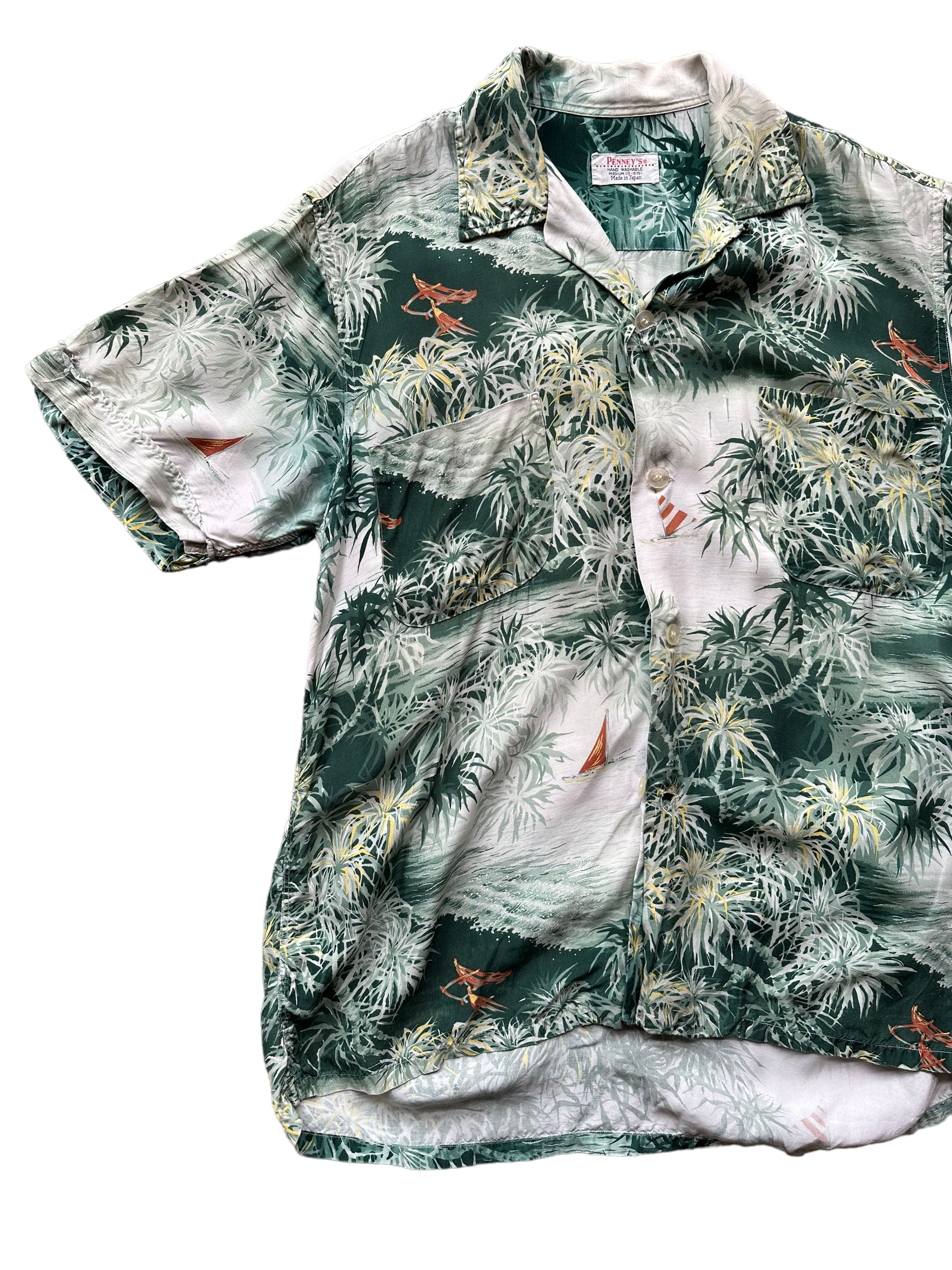 Front right of Vintage Made in Japan Penney's Green Floral Aloha Shirt SZ M | Seattle Vintage Rayon Hawaiian Shirt | Barn Owl Vintage Clothing Seattle