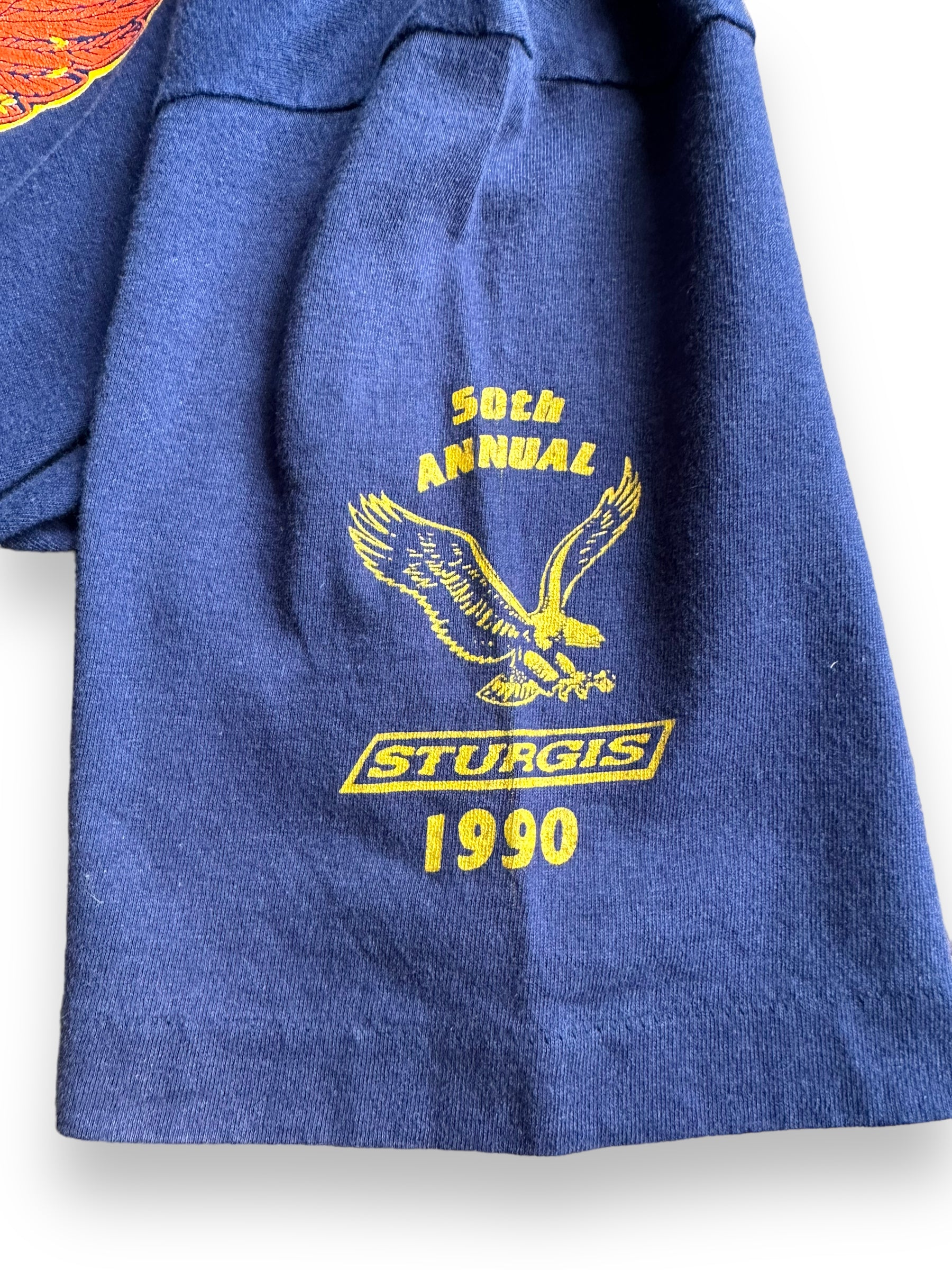 Left sleeve of '90 Blue Sturgis 50th Anniversary Tee SZ L | Vintage Harley Tee | Barn Owl Vintage Seattle