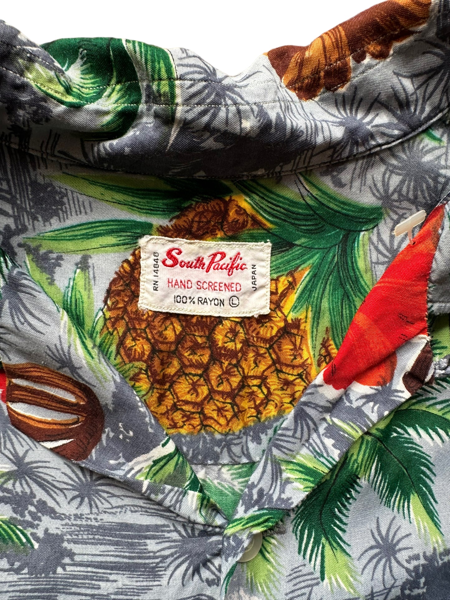 Tag close up of Vintage Made in Japan South Pacific Grey Pineapple Aloha Shirt SZ L | Seattle Vintage Rayon Hawaiian Shirt | Barn Owl Vintage Clothing Seattle
