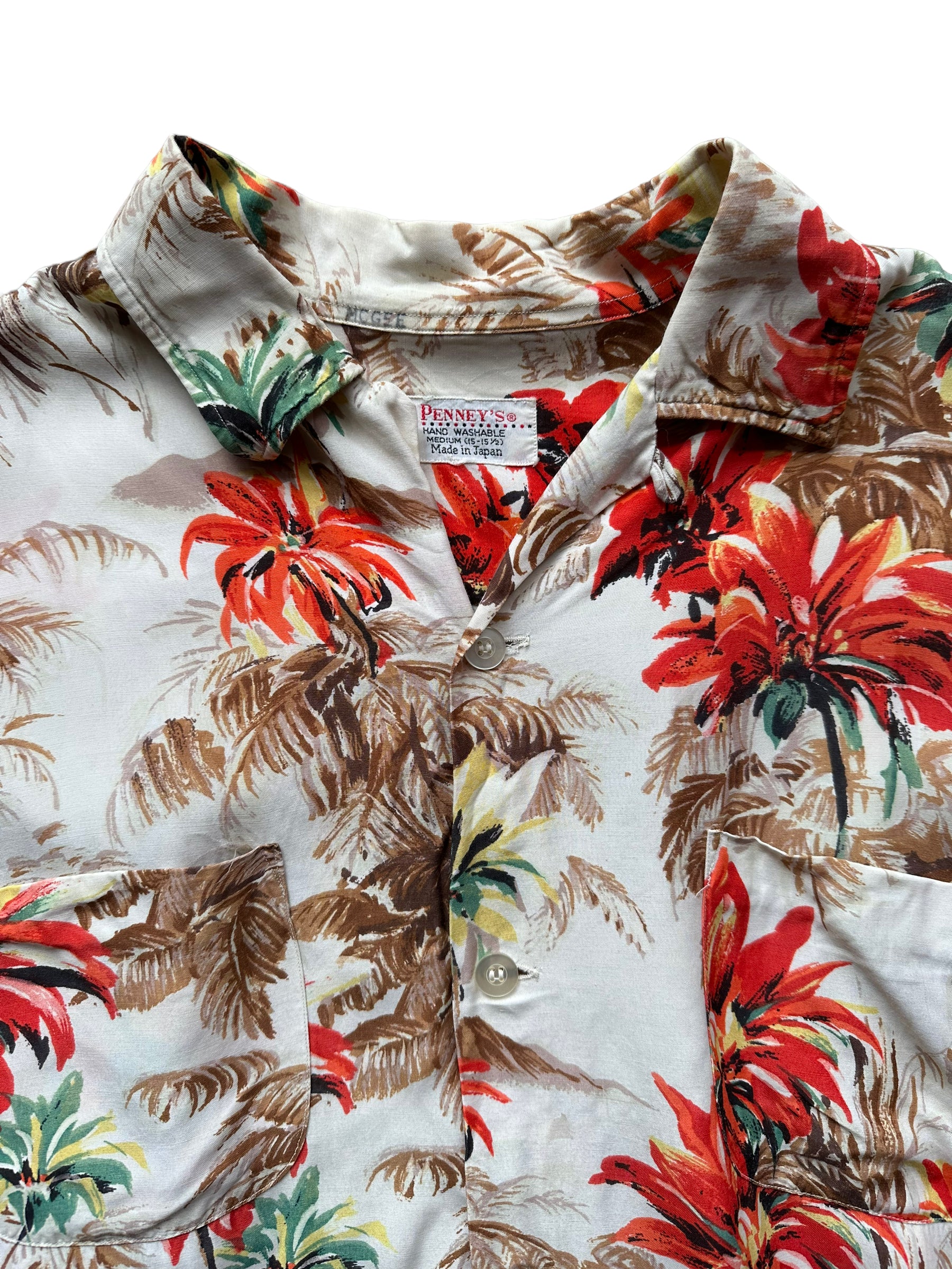 Tag shot of Vintage Made in Japan Penney's Brown/Orange Floral Aloha Shirt SZ M | Seattle Vintage Rayon Hawaiian Shirt | Barn Owl Vintage Clothing Seattle