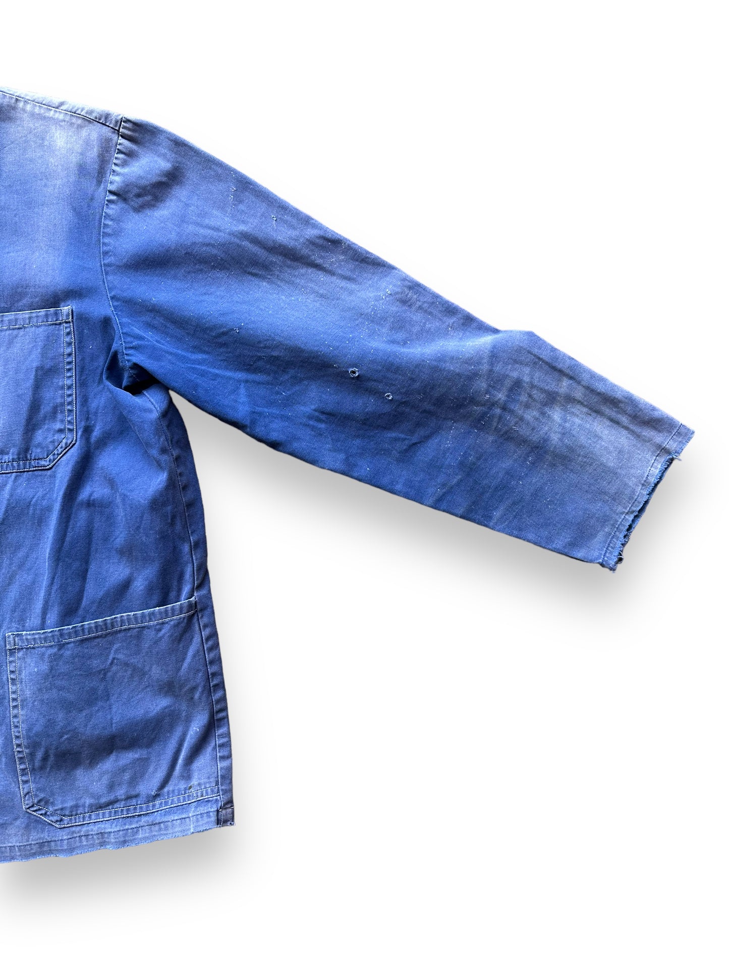 Left Sleeve View on Vintage Faded French Workwear Chore Coat SZ L | Vintage European Workwear Seattle | Barn Owl Vintage Goods Seattle