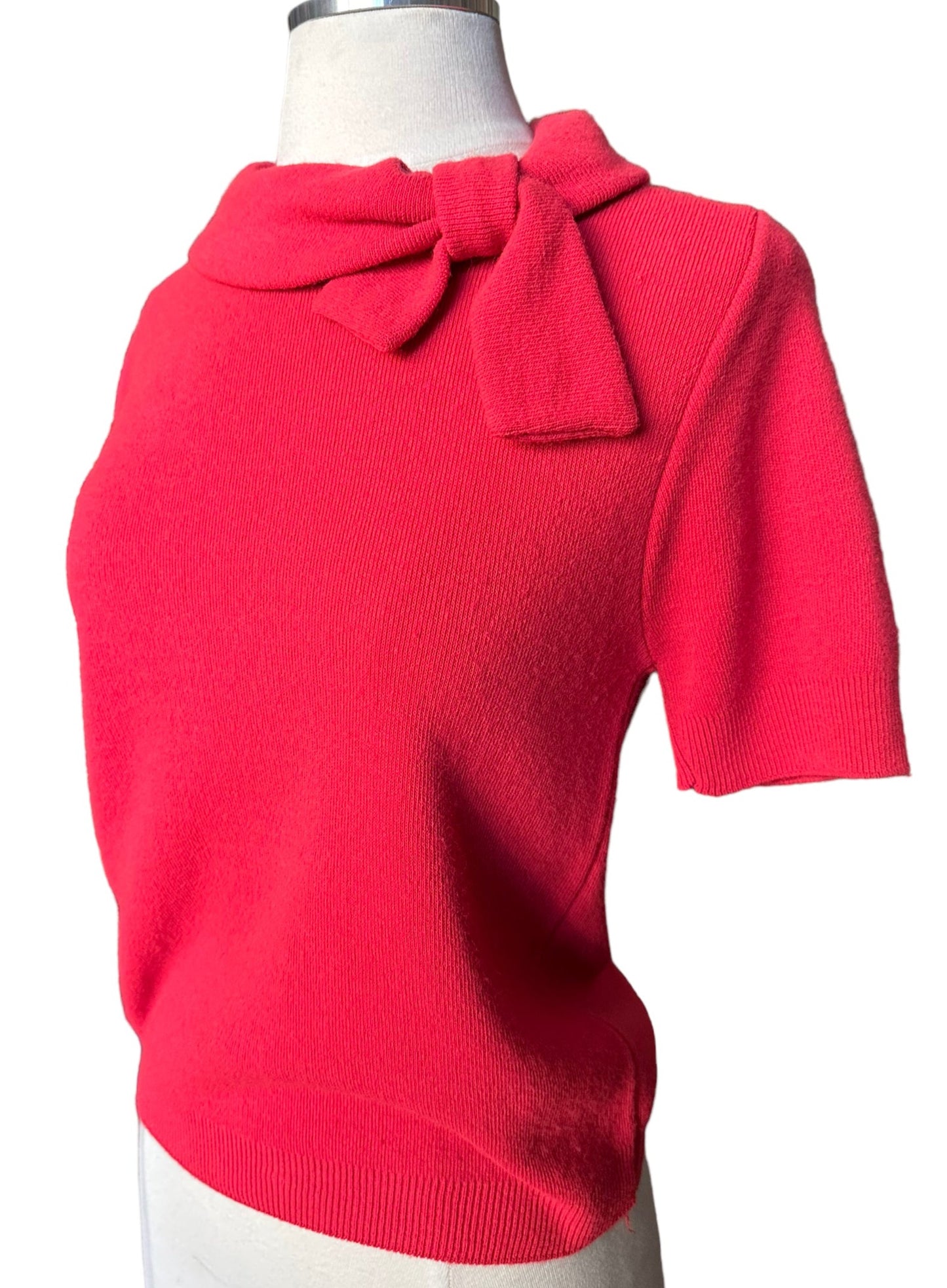 Left side view of Vintage 1950s Coral Pink Orlon Short Sleeve Sweater | Vintage 1950s Sweaters | Barn Owl Ladies Vintage