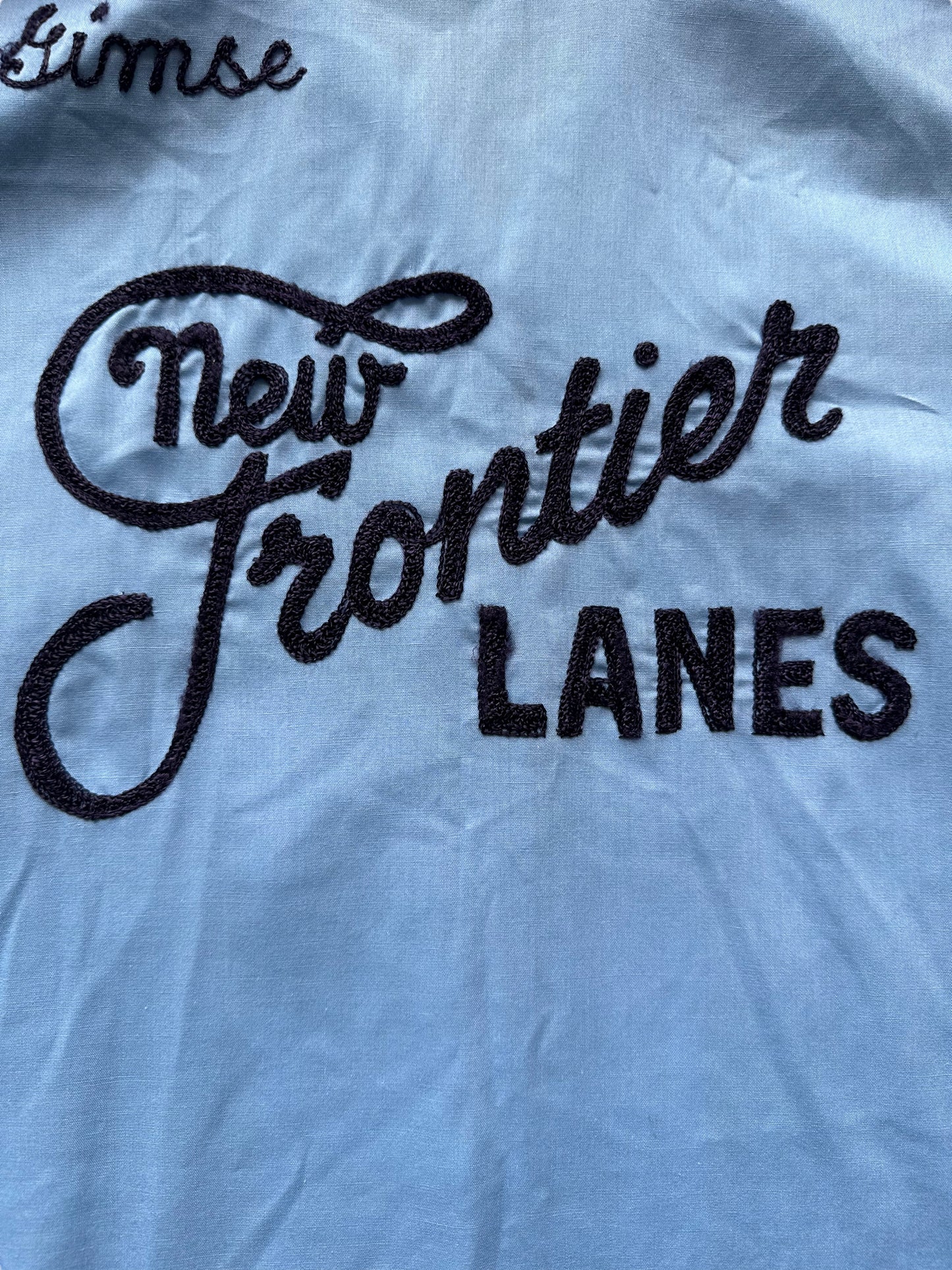 Back chainstitching close up of Vintage "New Frontier Lanes" Chainstitched Bowling Shirt SZ 40 | Vintage Bowling Shirt Seattle | Barn Owl Vintage Seattle