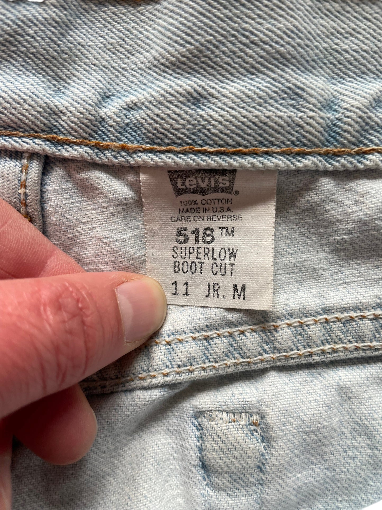 Size tag view of Vintage USA Levi's 518 34x32
