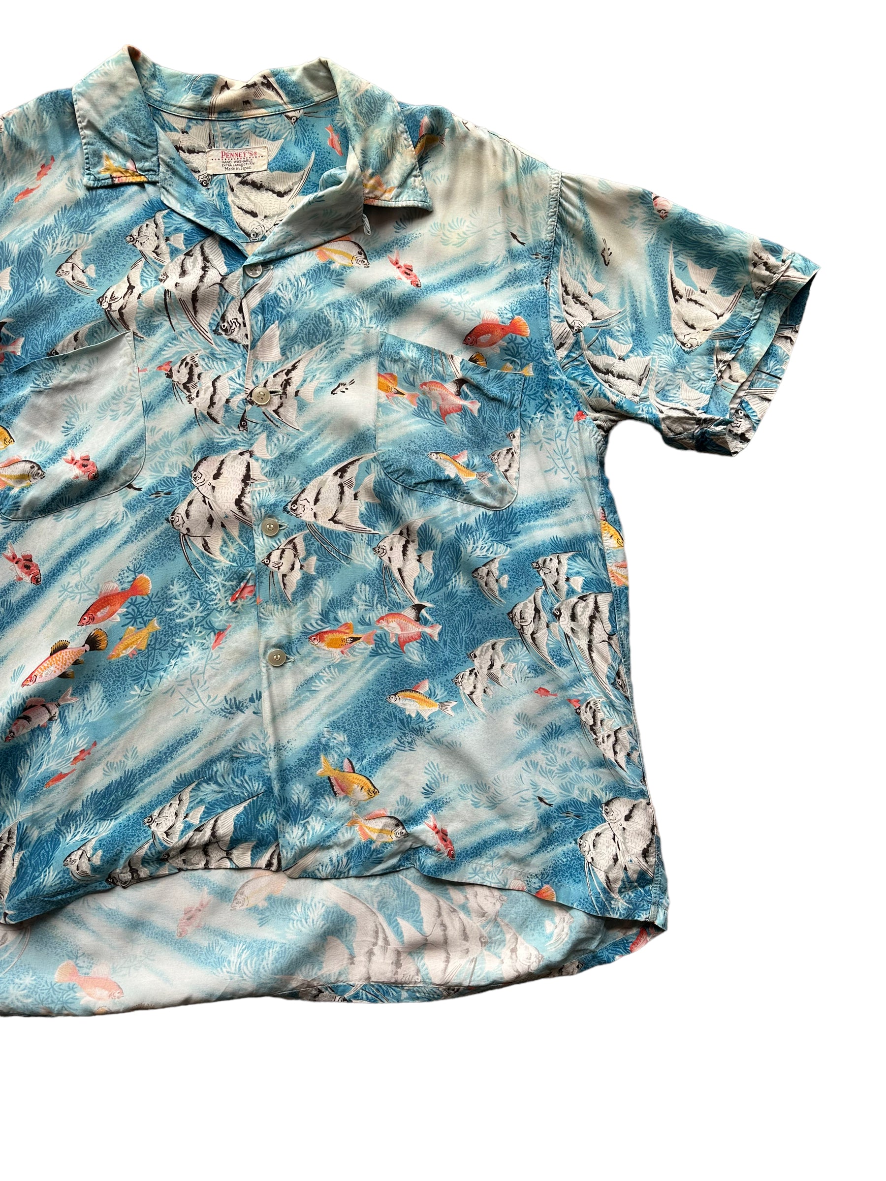 Front left shot of Vintage Penny's Blue Tropical Fish Aloha Shirt SZ XL | Seattle Vintage Rayon Hawaiian Shirt | Barn Owl Vintage Clothing Seattle