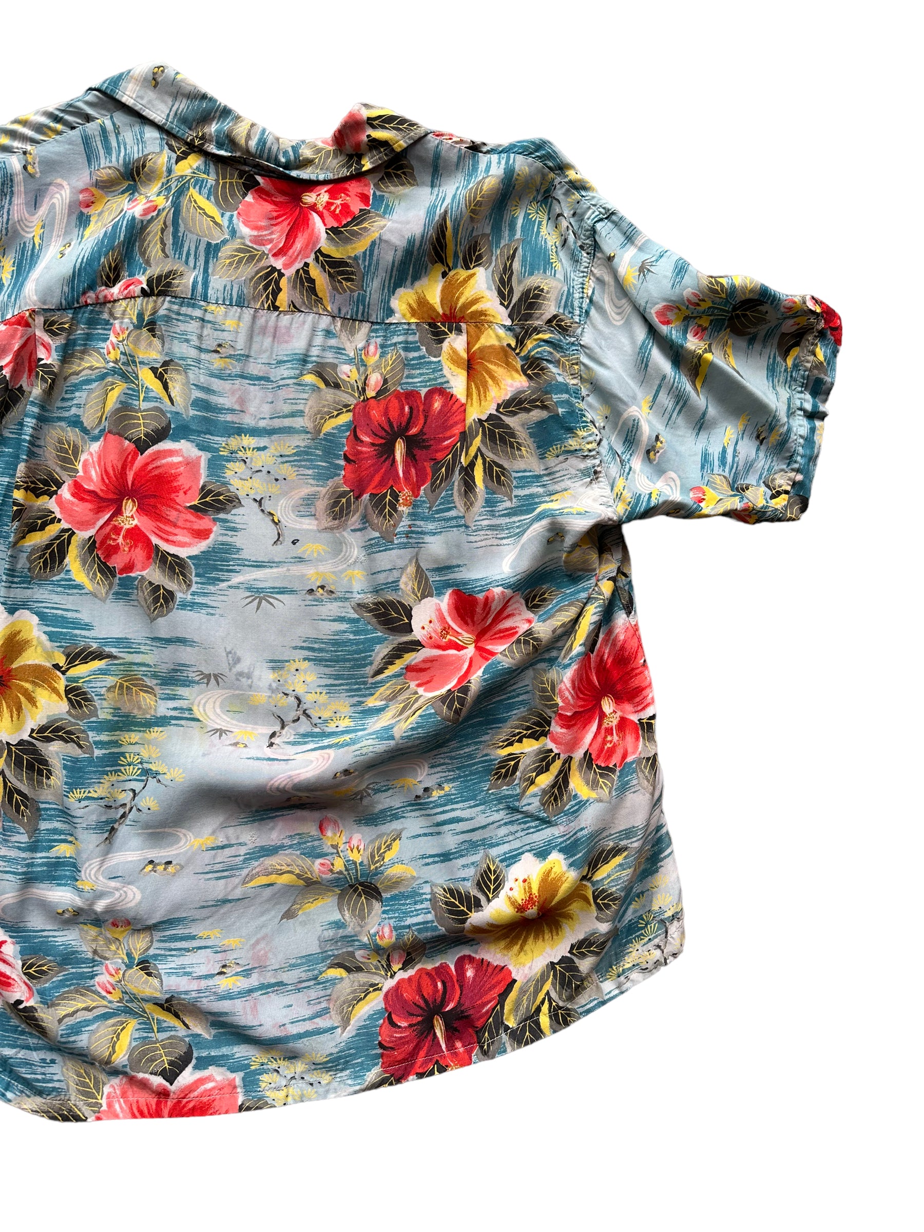 Back right of Vintage Made in Japan Penney's Blue/Pink/Yellow Floral Aloha Shirt SZ L | Seattle Vintage Rayon Hawaiian Shirt | Barn Owl Vintage Clothing Seattle