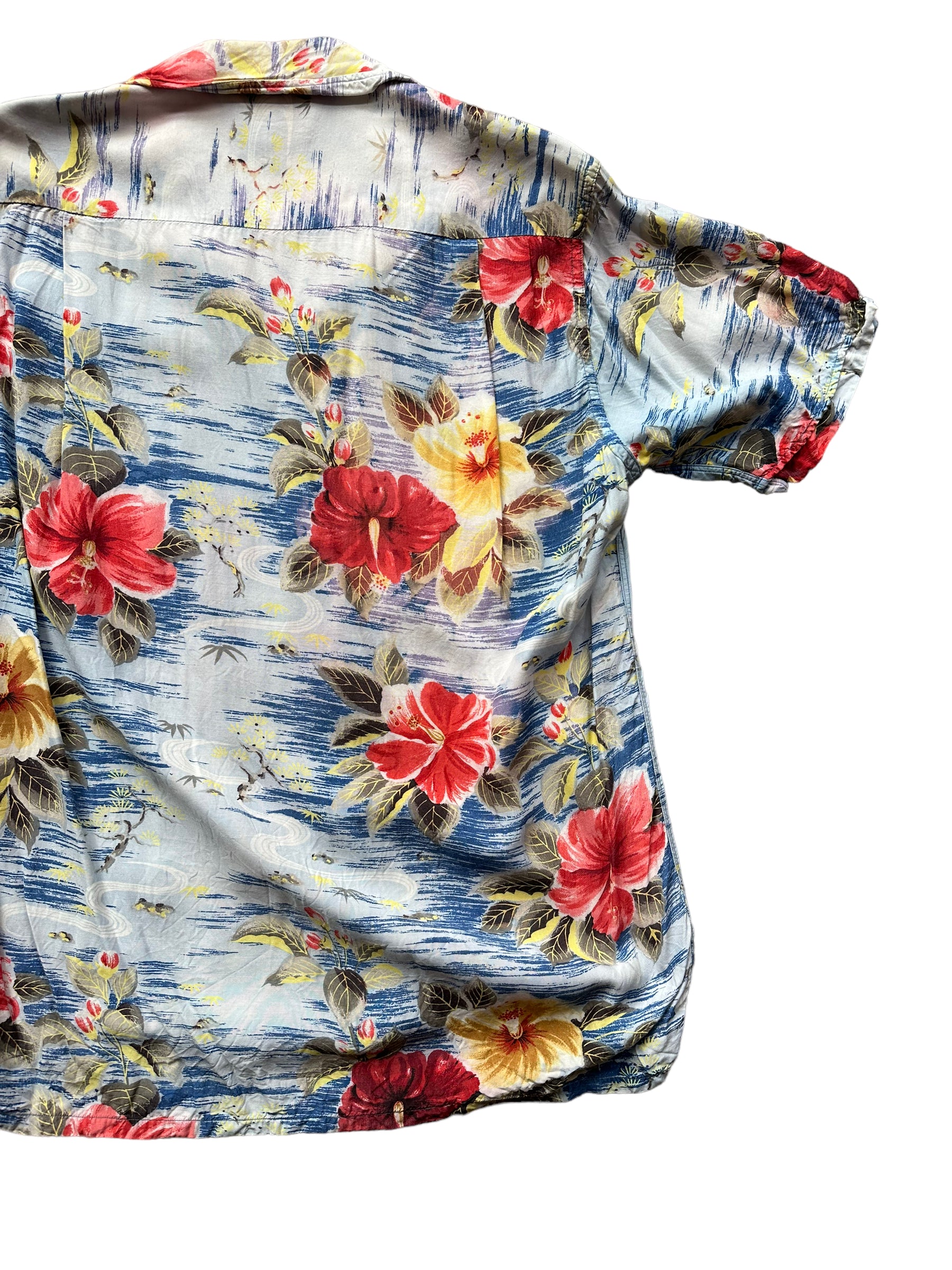 Back right of Vintage Made in Japan Penney's Blue/Red/Yellow Floral Aloha Shirt SZ S | Seattle Vintage Rayon Hawaiian Shirt | Barn Owl Vintage Clothing Seattle