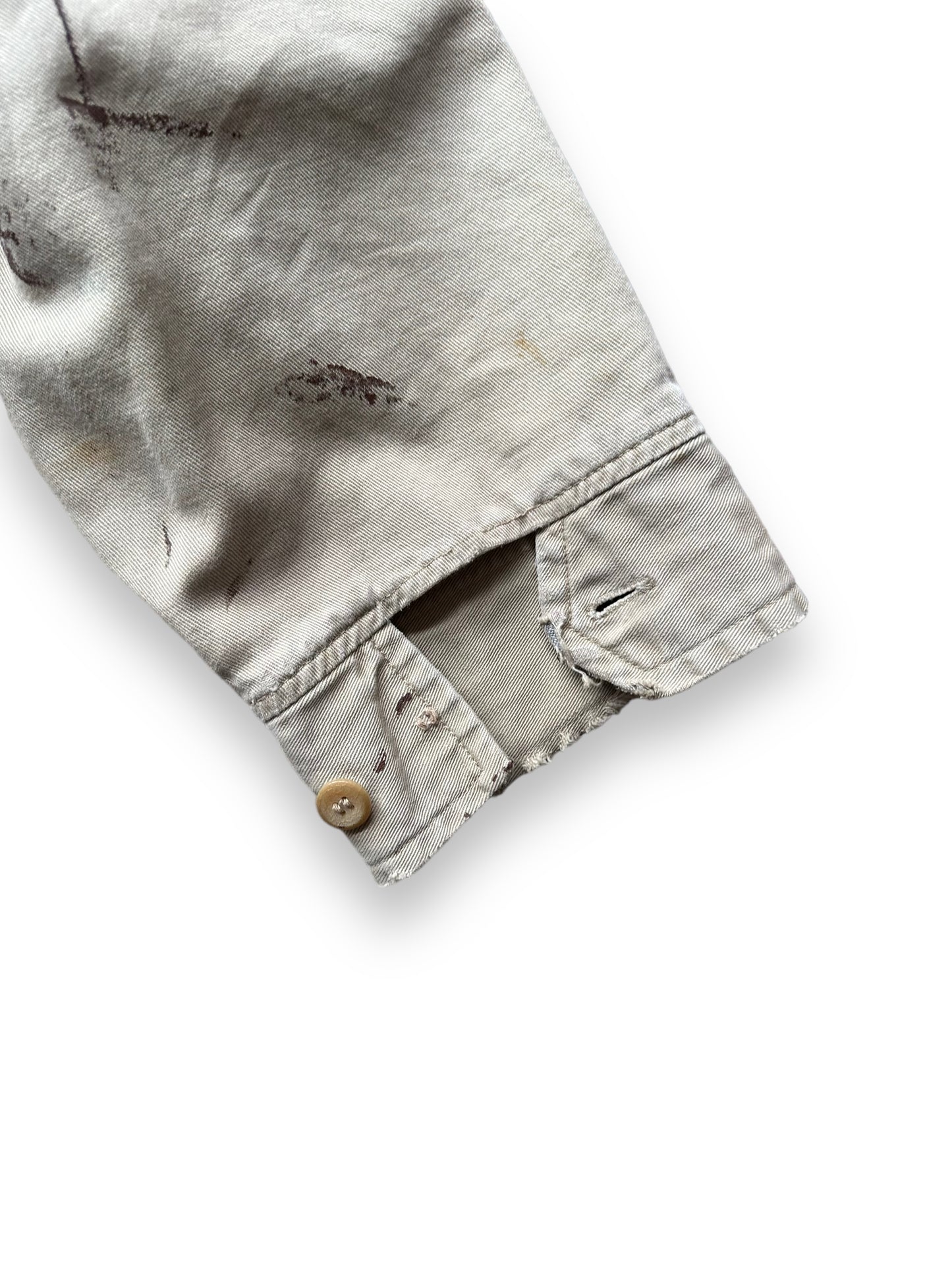 Left Cuff Missing One Button on Vintage Cropped Workwear Khaki Jacket SZ L | Vintage European Workwear Seattle | Barn Owl Vintage Goods Seattle