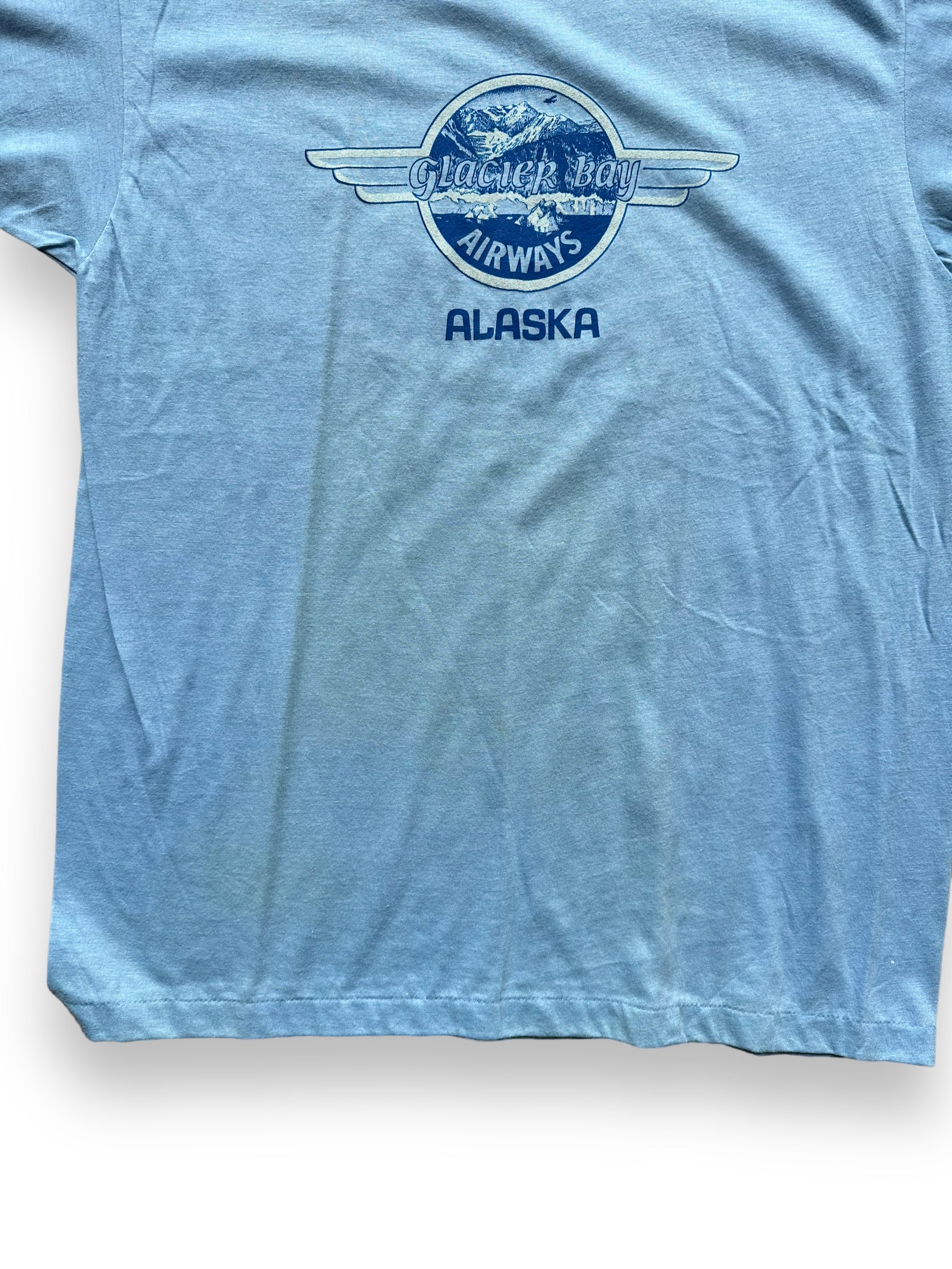 Shot of discoloring of Vintage Glacier Bay Airways Alaska Tee SZ L | Vintage T-Shirts Seattle | Barn Owl Vintage Tees Seattle