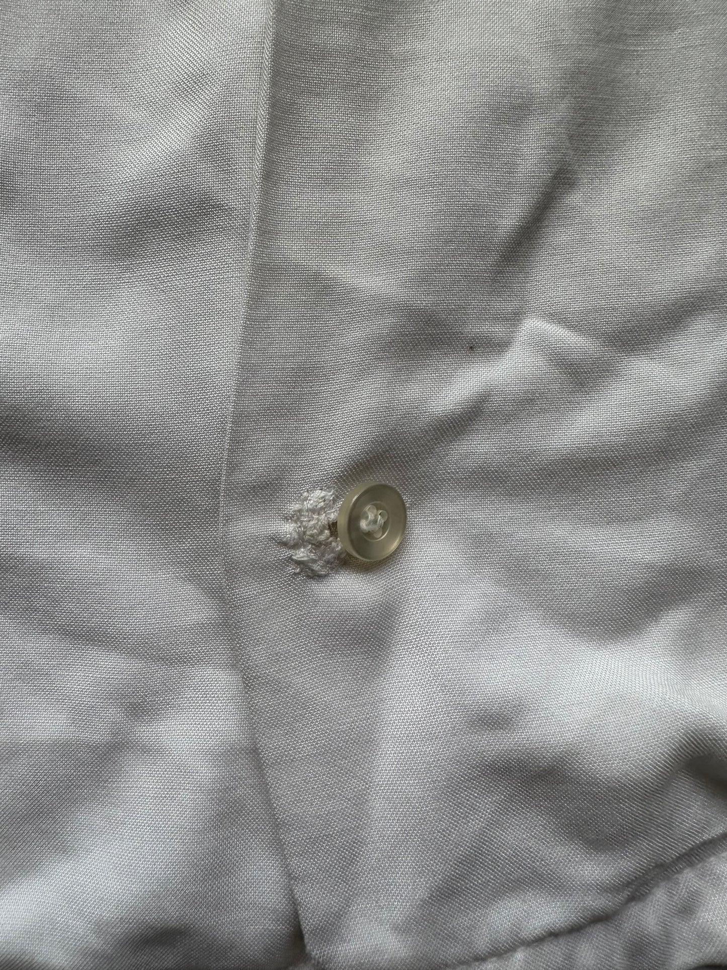 Bottom repaired button hole on Vintage "Standard Oil Co." Chainstitched Bowling Shirt SZ M | Vintage Bowling Shirt Seattle | Barn Owl Vintage Seattle