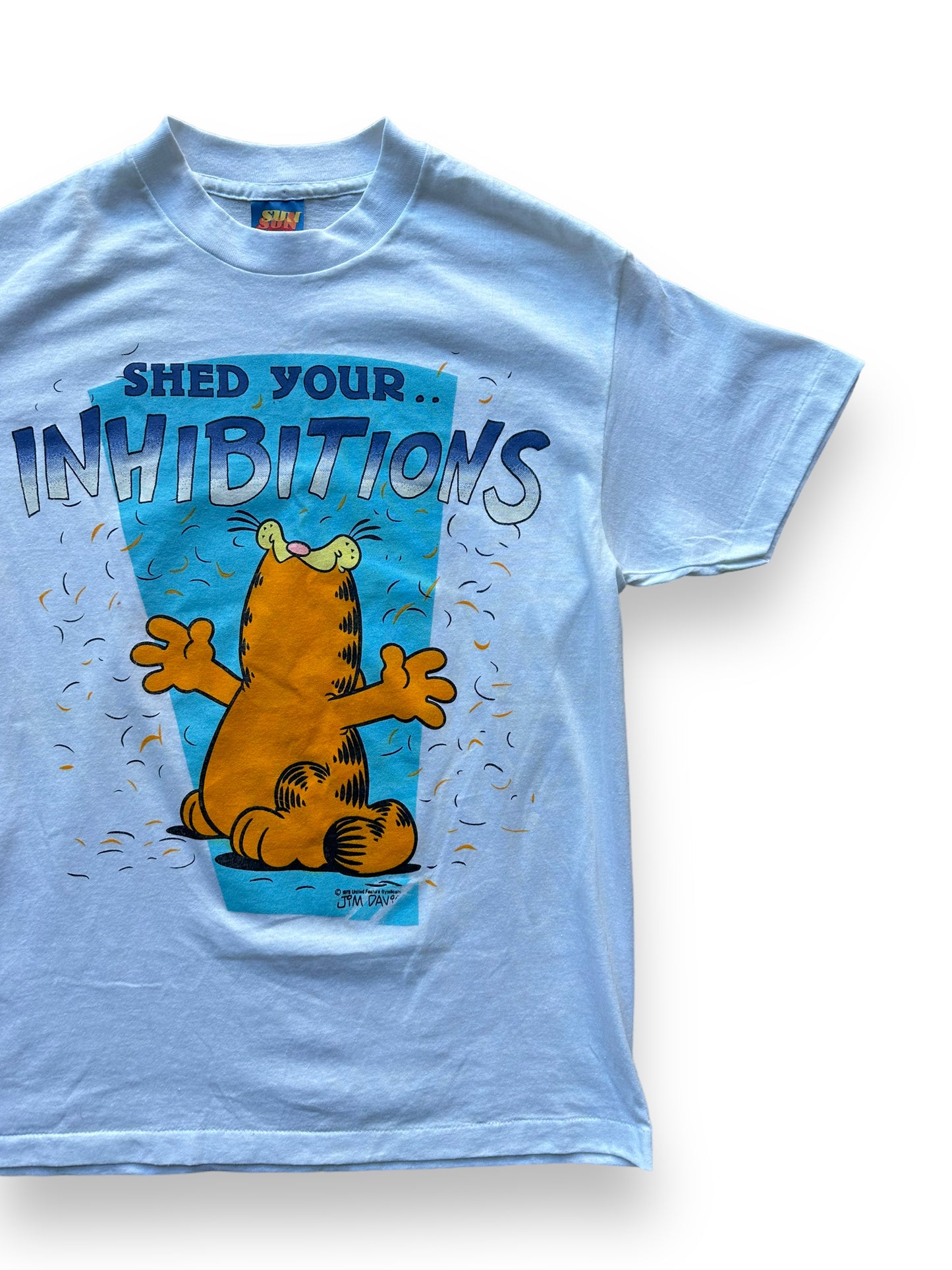 Front left of Vintage Garfield "Shed Your Inhibitions" Tee SZ M |  Vintage Cat Tee Seattle | Barn Owl Vintage