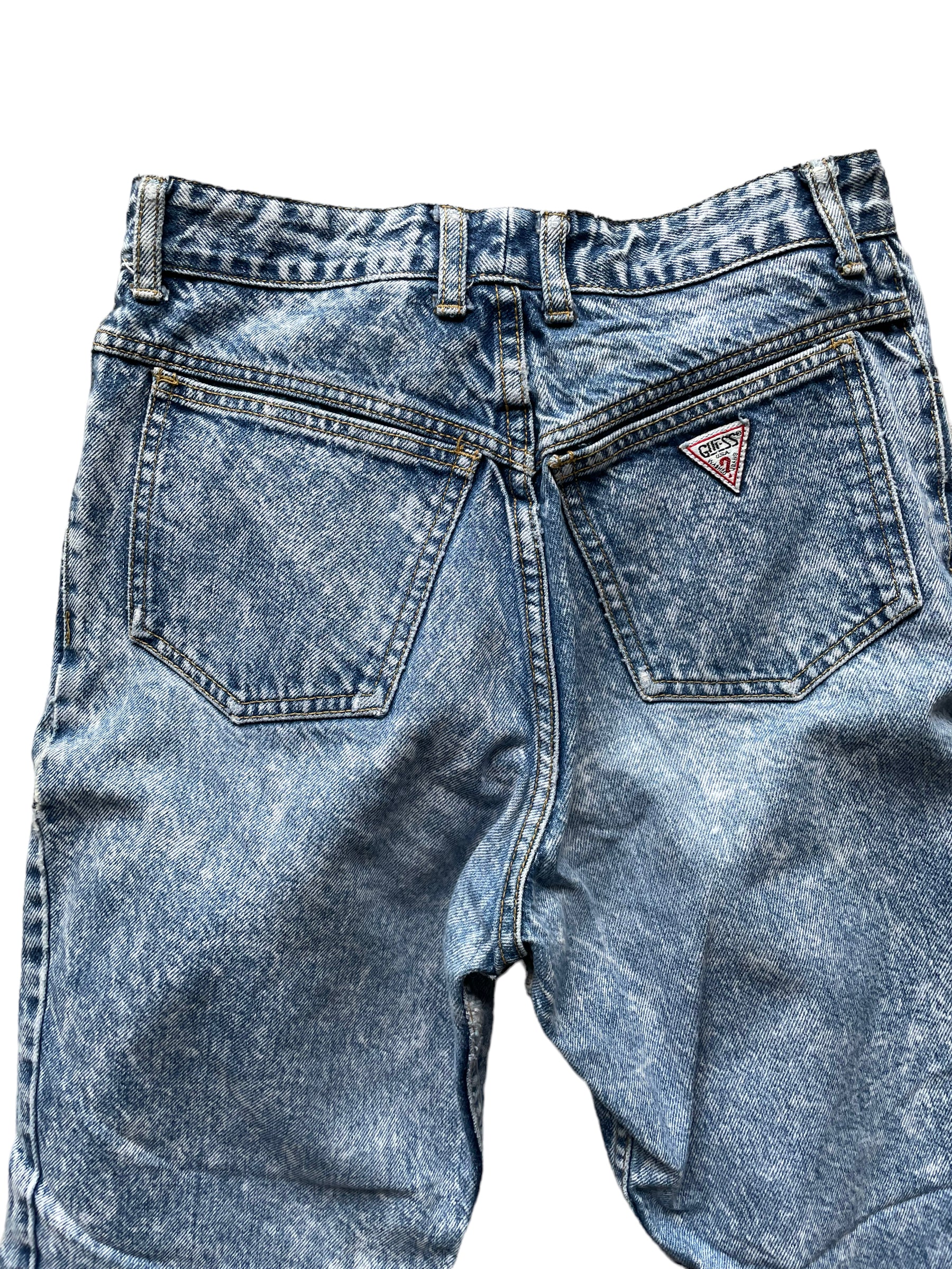 Back pocket view of Vintage 80s Ankle Zip Acid Wash Guess Jeans