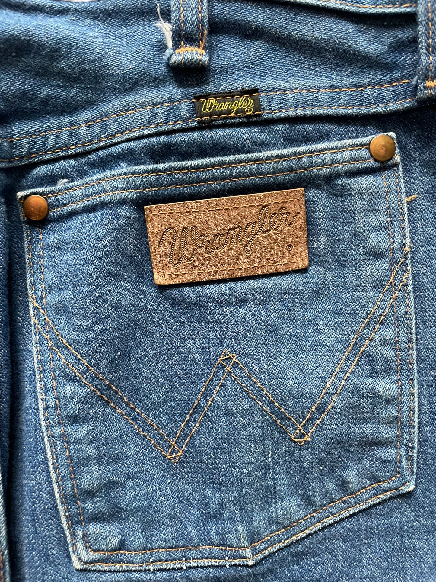 Back tag view of Vintage 1960s Era Wranglers 32x34