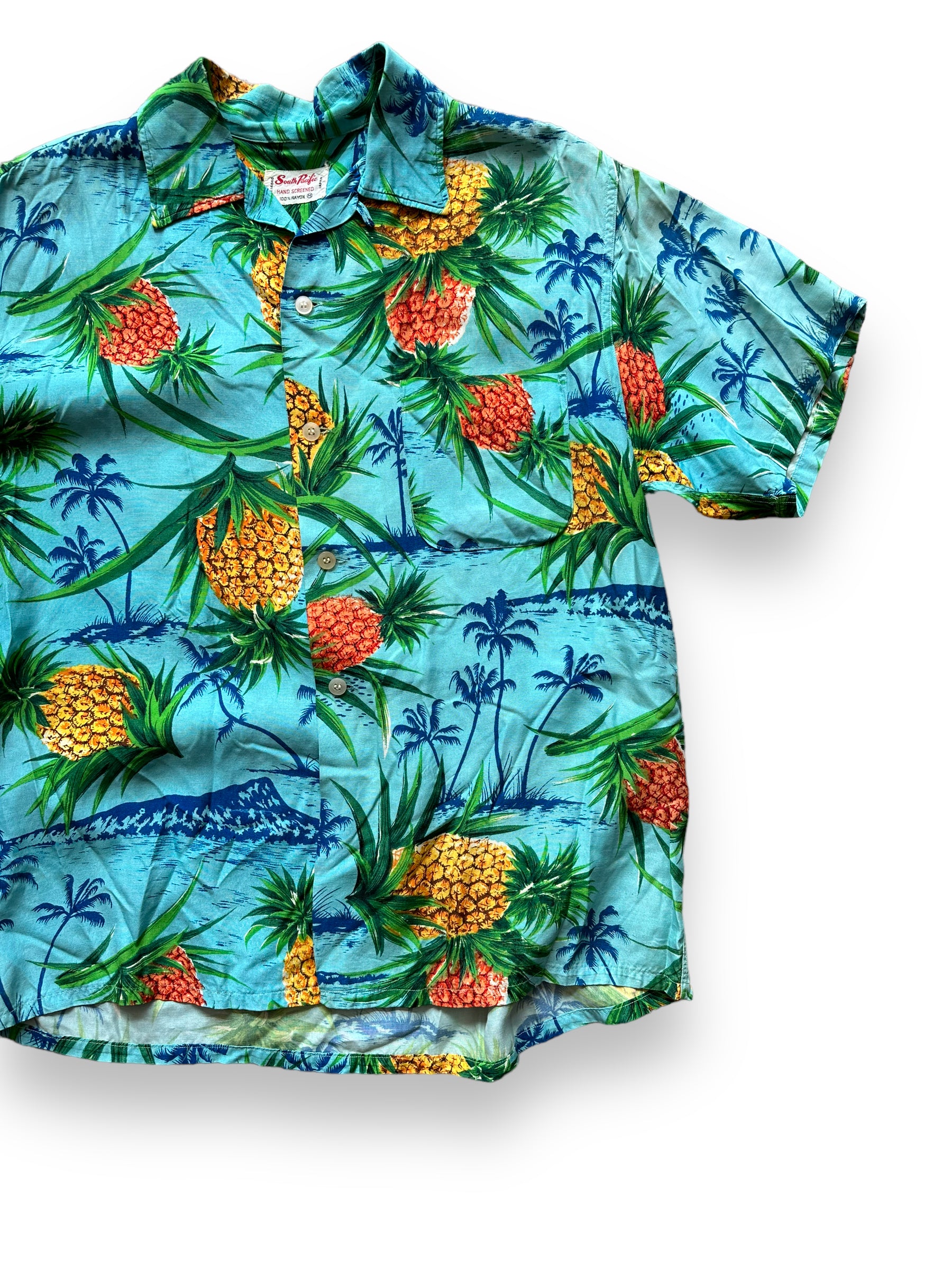 Front Left View of Vintage South Pacific Blue Pineapple Aloha Shirt SZ M | Seattle Vintage Rayon Hawaiian Shirt | Barn Owl Vintage Clothing Seattle