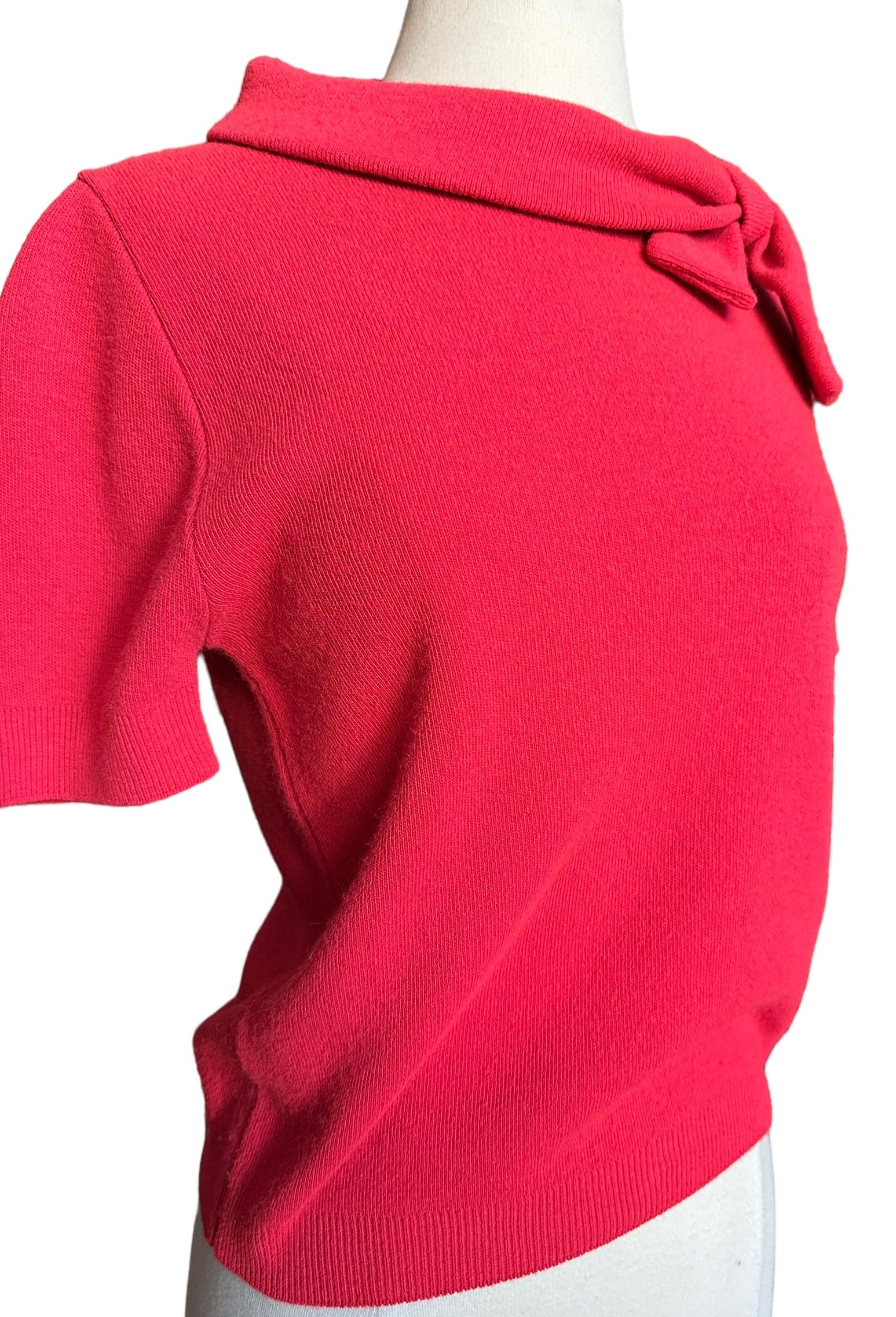 Front right side view of Vintage 1950s Coral Pink Orlon Short Sleeve Sweater | Vintage 1950s Sweaters | Barn Owl Ladies Vintage