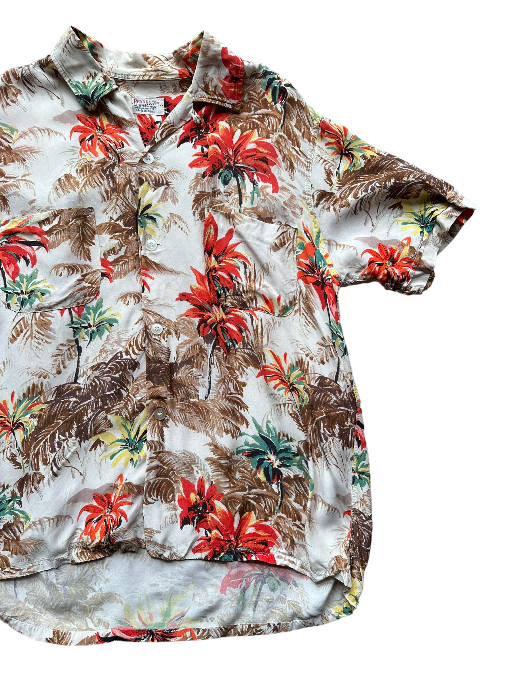 Front left of Vintage Made in Japan Penney's Brown/Orange Floral Aloha Shirt SZ M | Seattle Vintage Rayon Hawaiian Shirt | Barn Owl Vintage Clothing Seattle