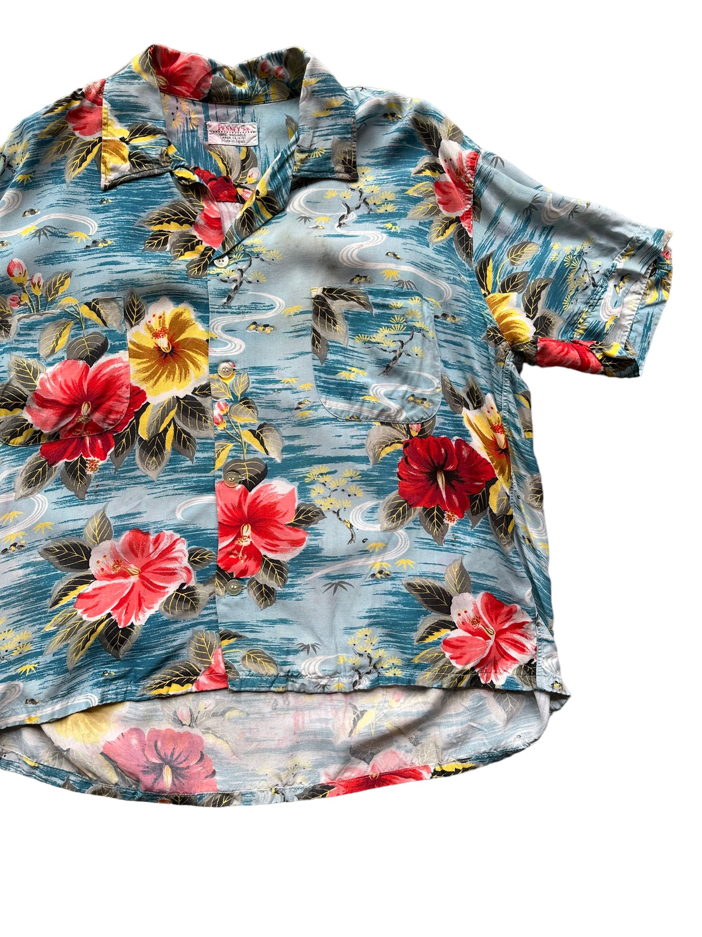 Front left of Vintage Made in Japan Penney's Blue/Pink/Yellow Floral Aloha Shirt SZ L | Seattle Vintage Rayon Hawaiian Shirt | Barn Owl Vintage Clothing Seattle