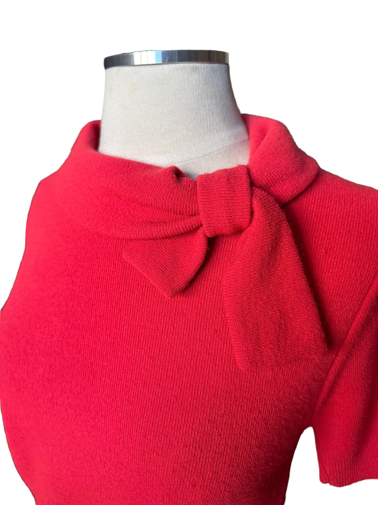 Bow view of Vintage 1950s Coral Pink Orlon Short Sleeve Sweater | Vintage 1950s Sweaters | Barn Owl Ladies Vintage
