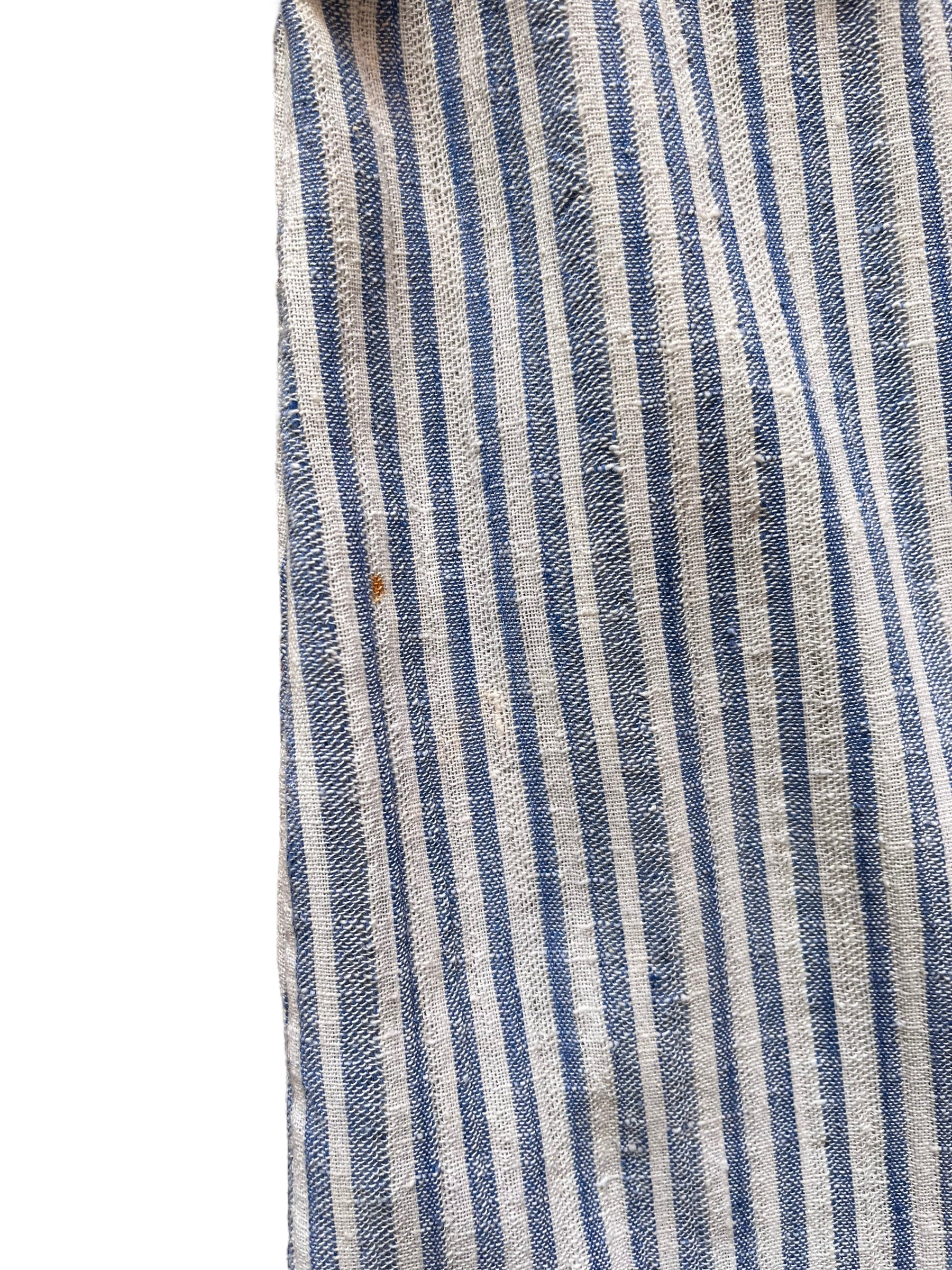 Small spot along the back left on Vintage 1970s Striped Kaftan by Beach Things