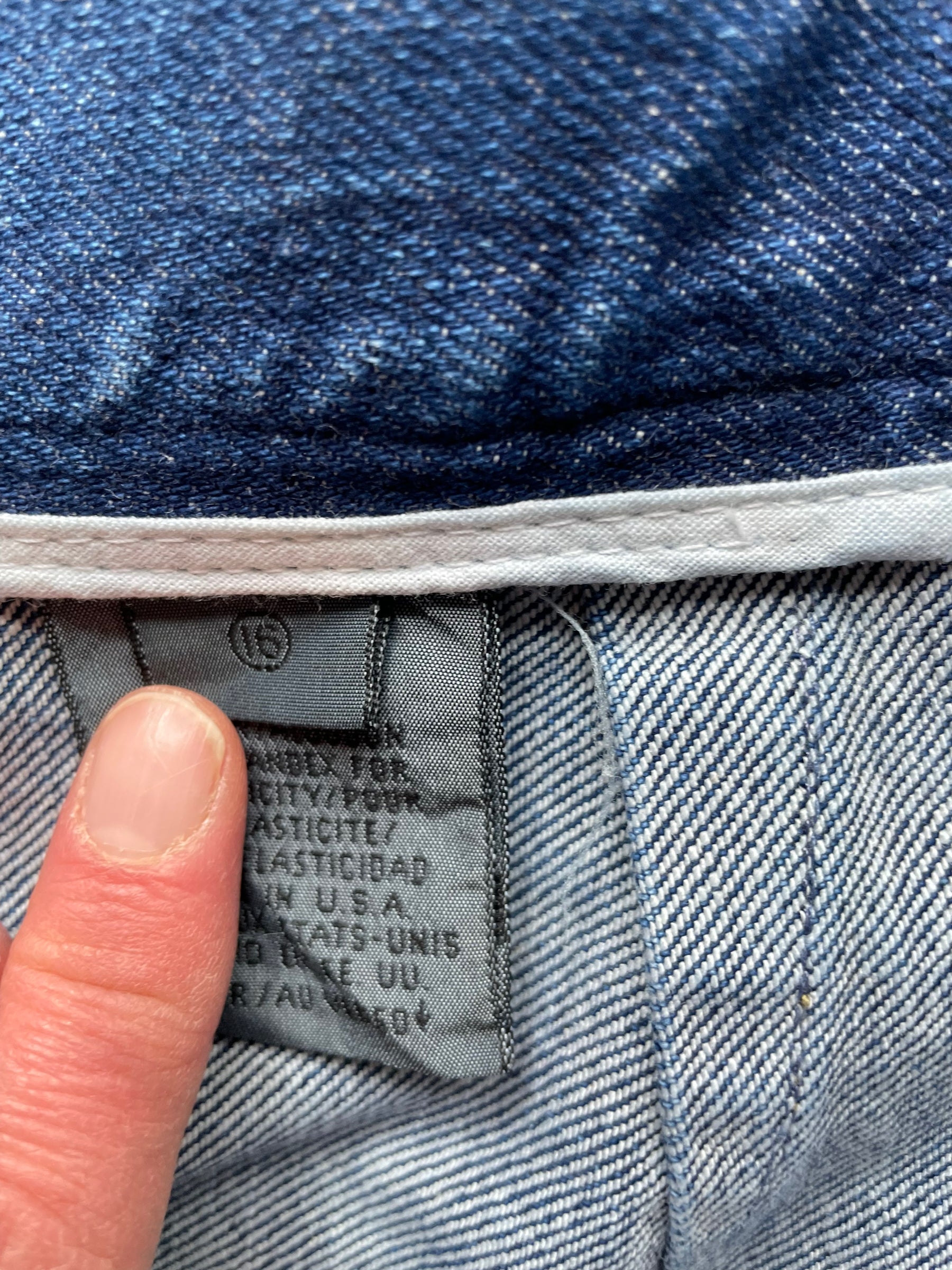 Size tag of Vintage Deadstock 80's Liz Claiborne Side Zip Stir Up Jeans