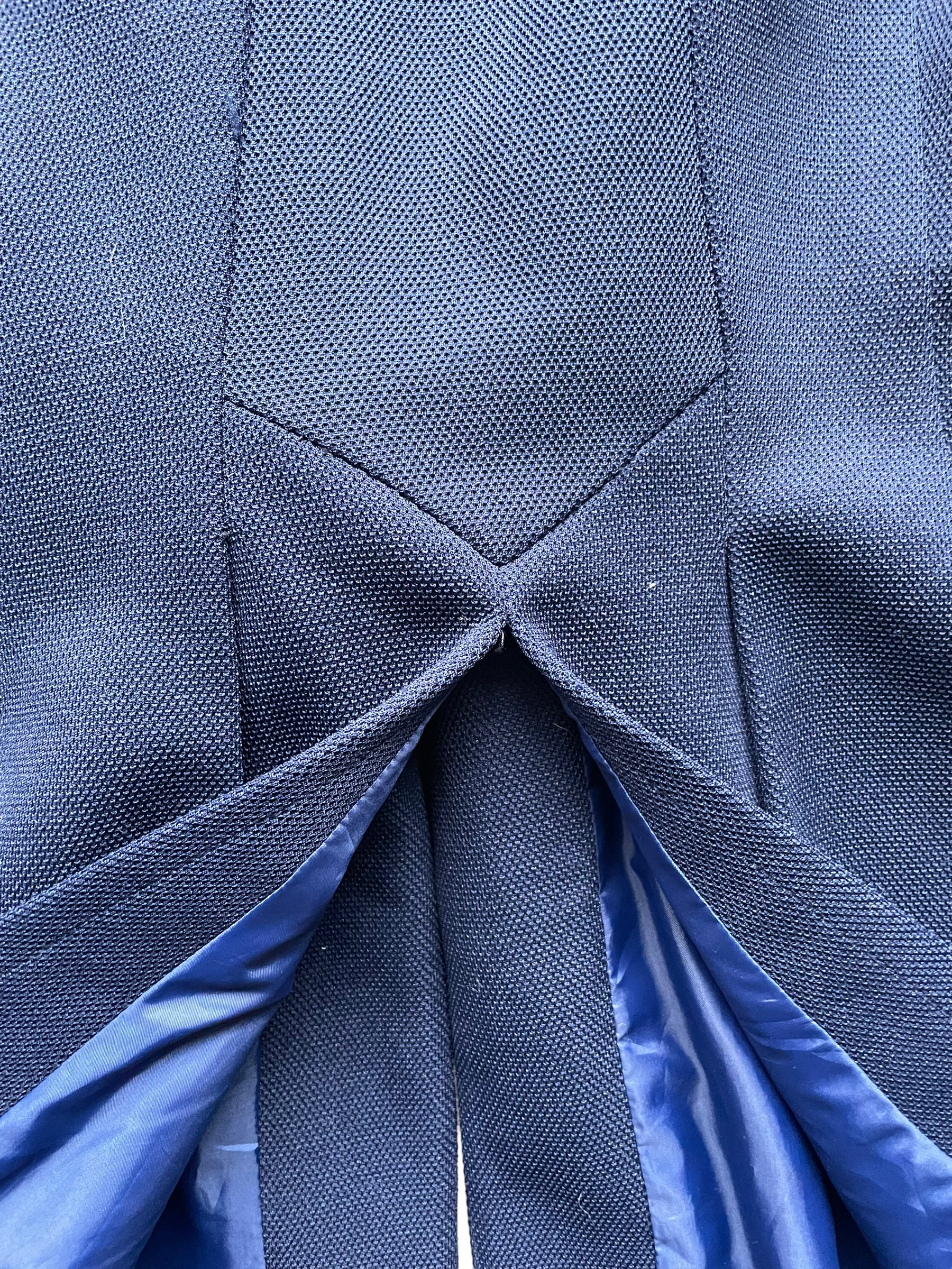 Detail of back split of Vintage 1960s Alfred Werber Long Heart Belted Vest