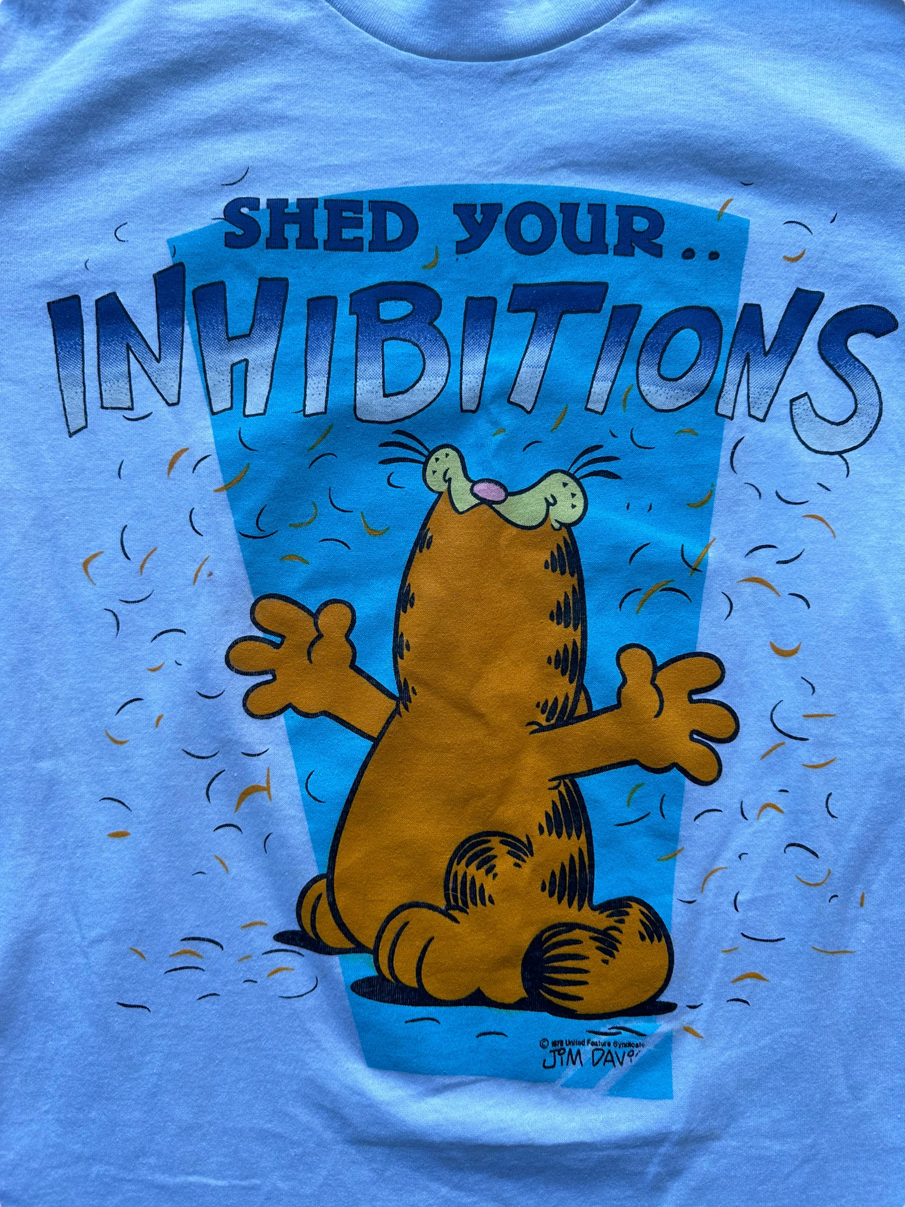 Graphic of Vintage Garfield "Shed Your Inhibitions" Tee SZ M |  Vintage Cat Tee Seattle | Barn Owl Vintage