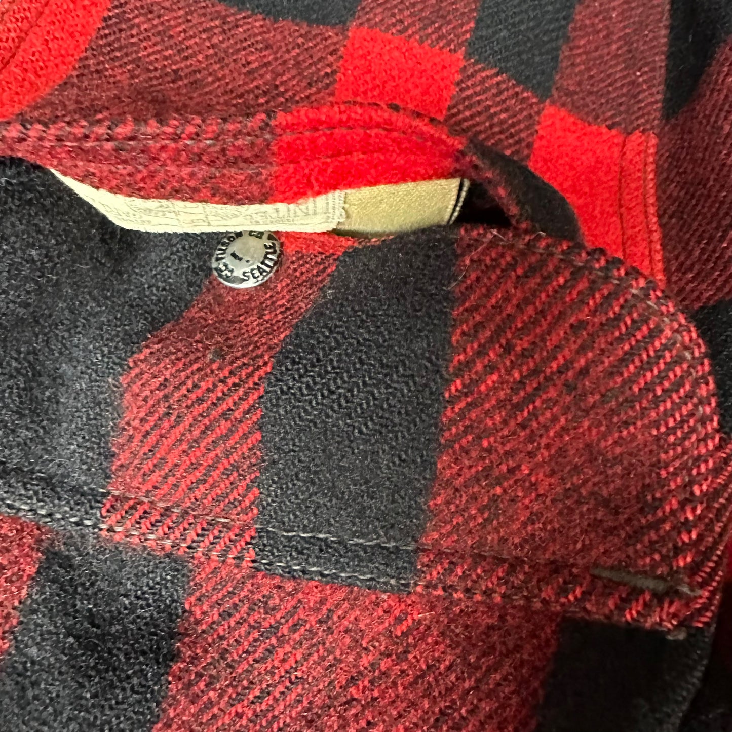Union Tag in Pocket of Vintage Early 1970s Filson Union Made Red and Black Mackinaw Cruiser SZ 44 |  Vintage Filson Cruiser | Vintage Workwear Seattle
