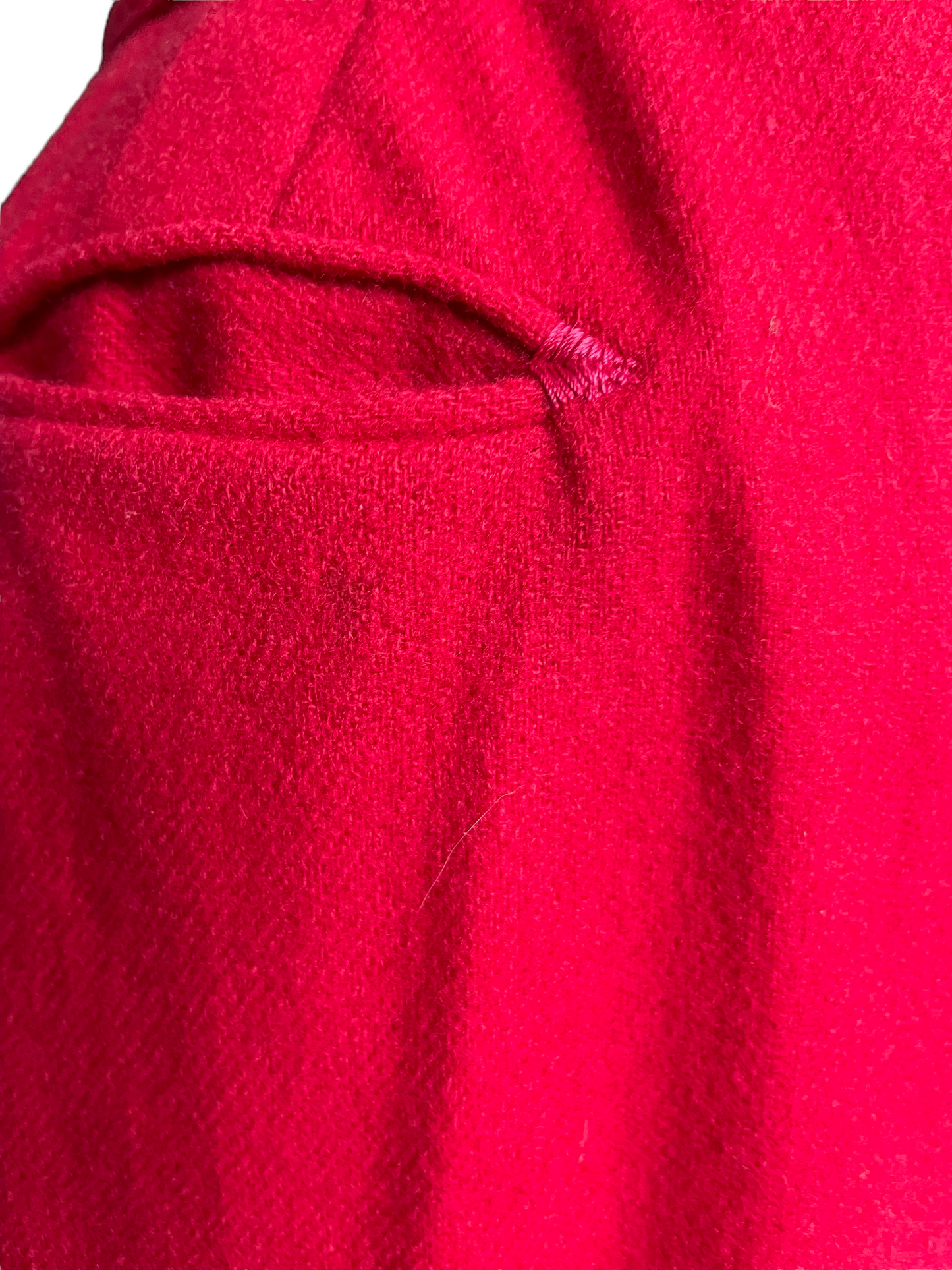 Small pocket view of two faint dark spots of Vintage 1950s Jantzen Wool Skirt SZ Sm | Barn Owl Vintage | Seattle Vintage Womens Clothing
